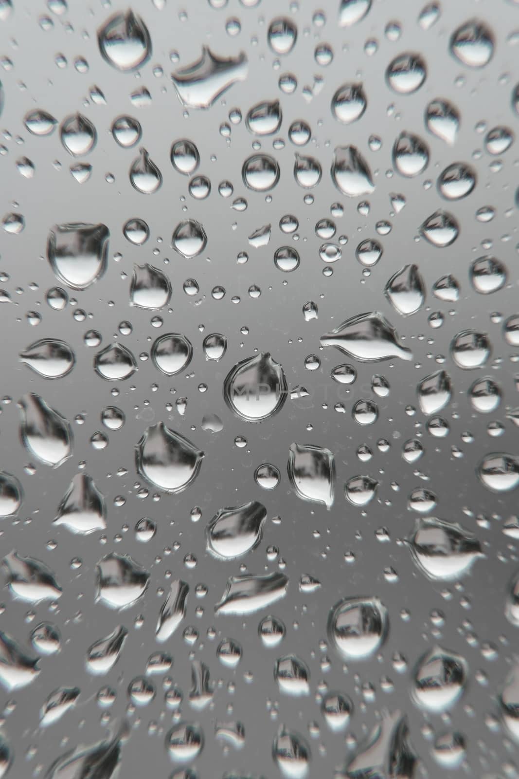 Drops of rain on the window, shallow dof