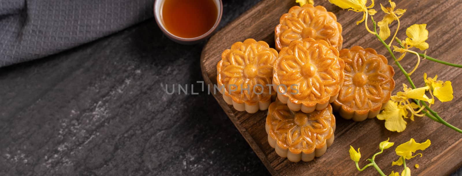Mooncake, Moon cake for Mid-Autumn Festival, concept of traditio by ROMIXIMAGE