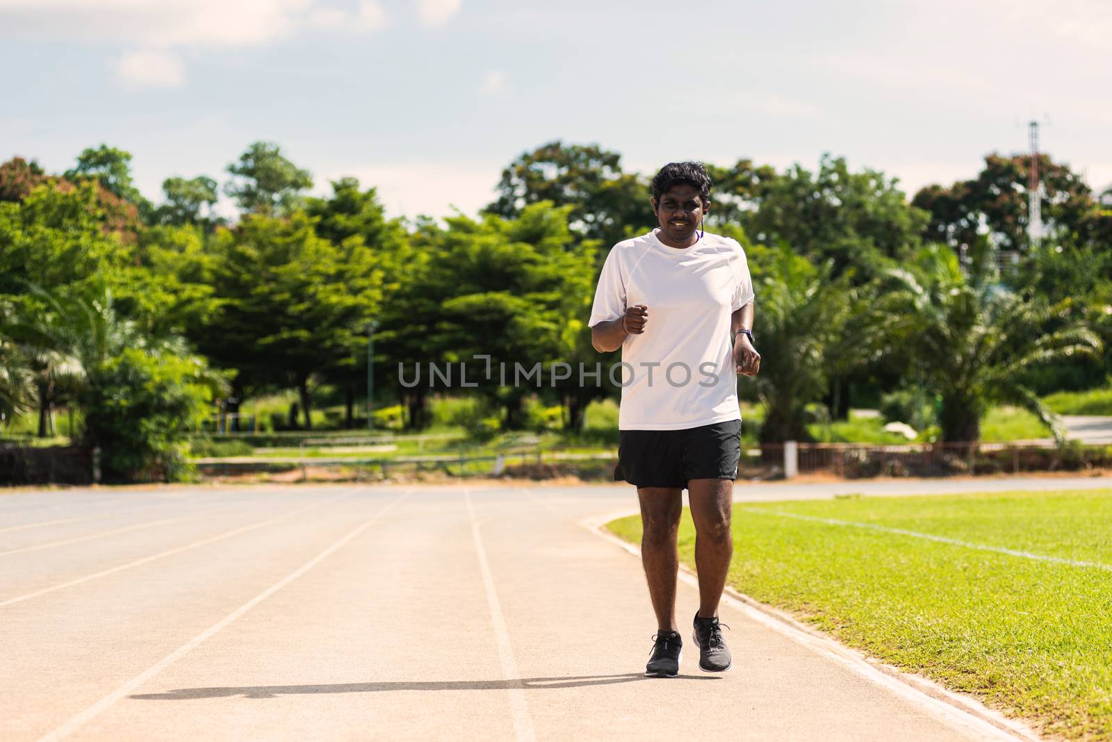 Asian young lifestyle athlete sport runner black man wear feet shoe active running training at the outdoor on the treadmill line road, healthy exercise workout