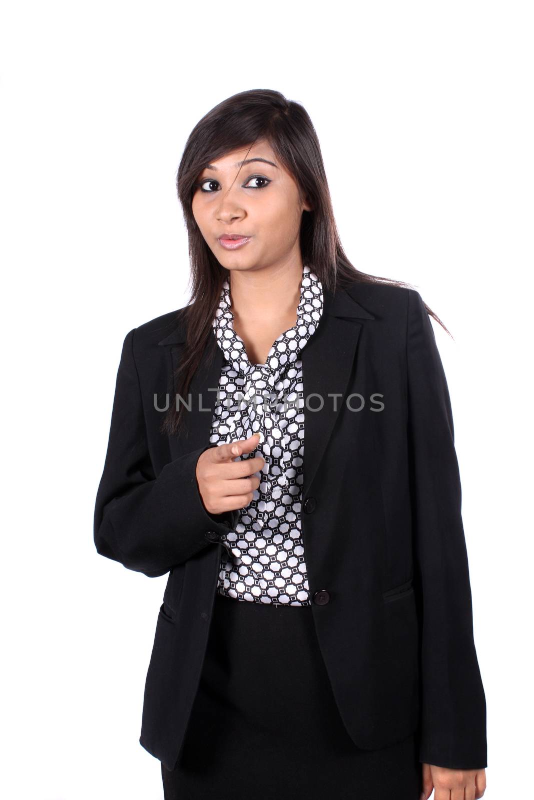 A young beautiful Indian businesswoman warning, on white studio background.
