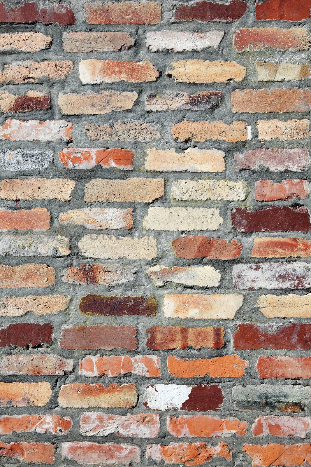 Old large red brick wall texture background distressed with white paint stock photo