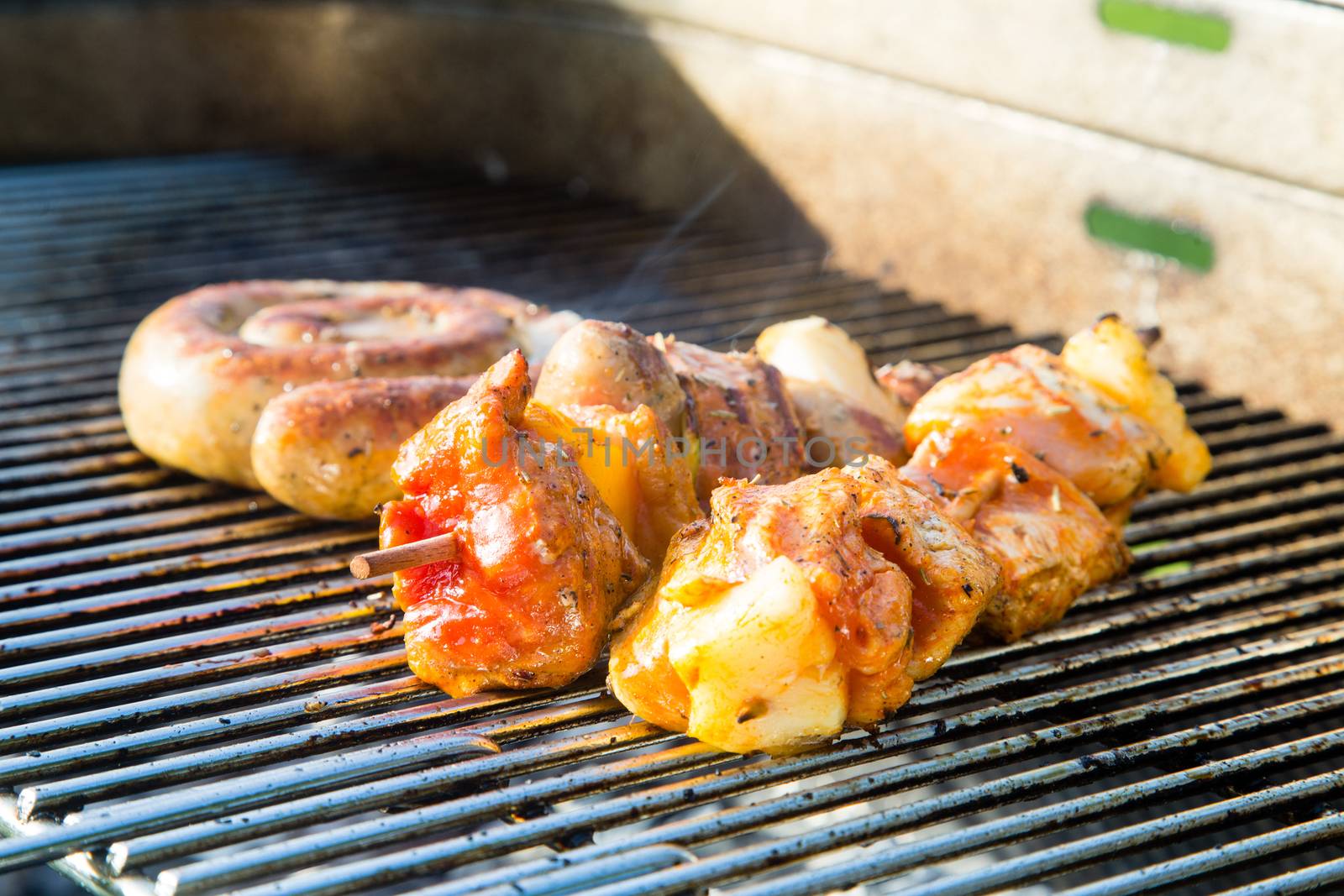 Grilled meat on a summer barbecue in the garden