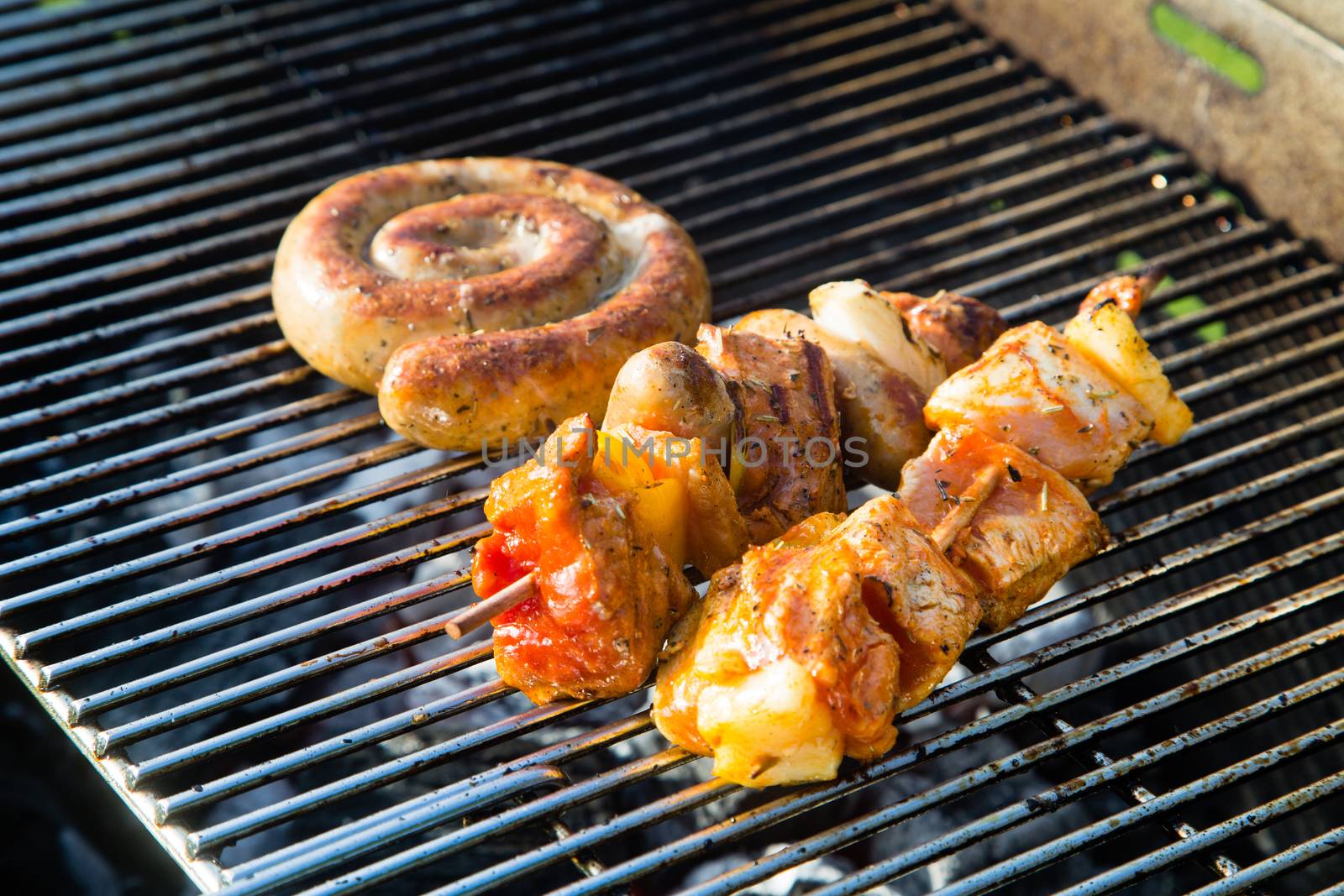 Grilled meat on a summer barbecue in the garden