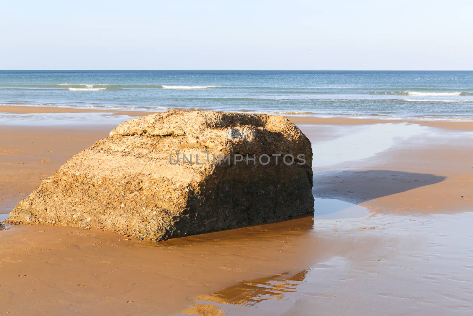 Ruins of harbor built by the Allies in Arromanches, Normandy, France