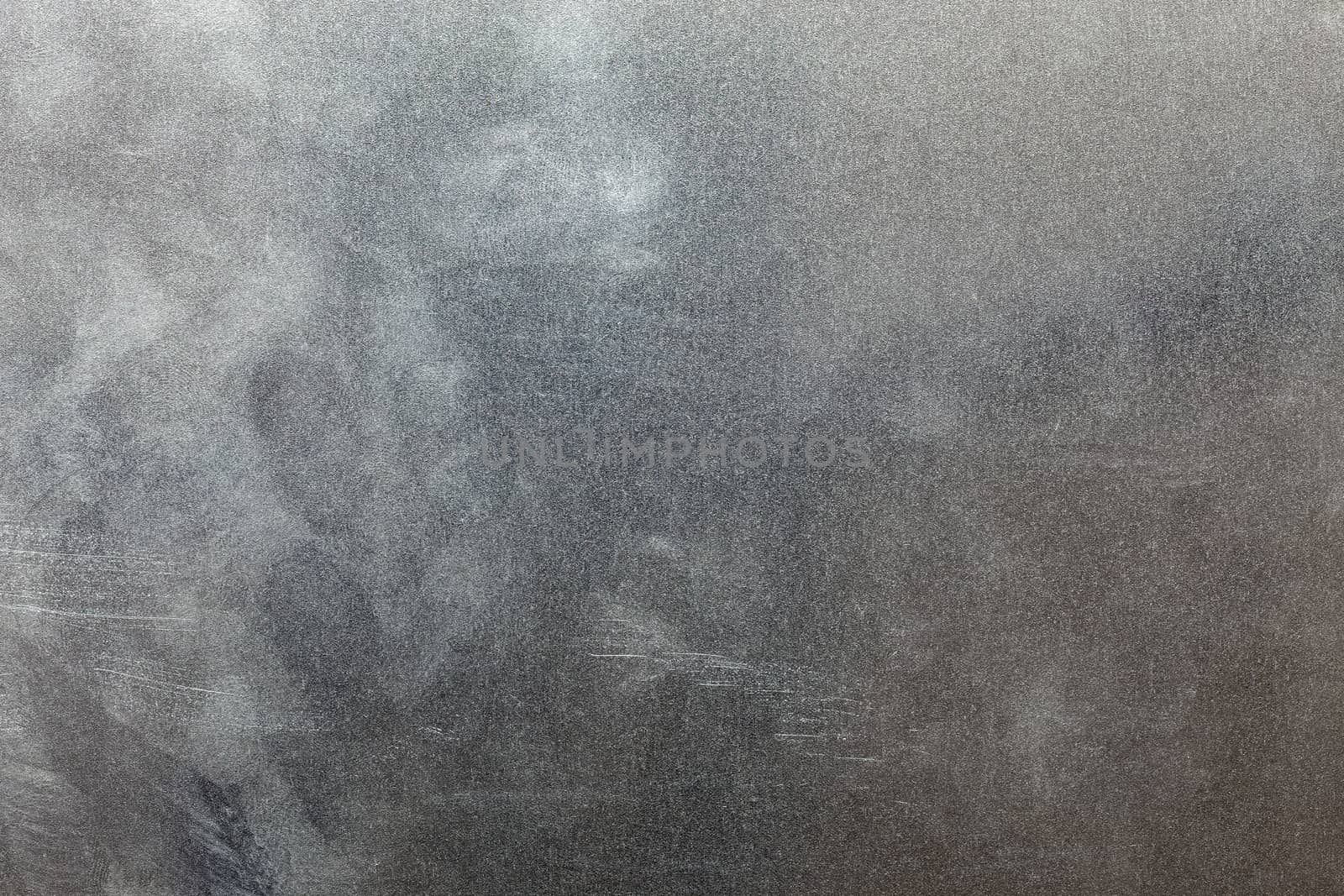 Uncoated flat cold rolled steel sheet surface with finger prints and hand fat dirt. Close-up in directly above composition. by z1b