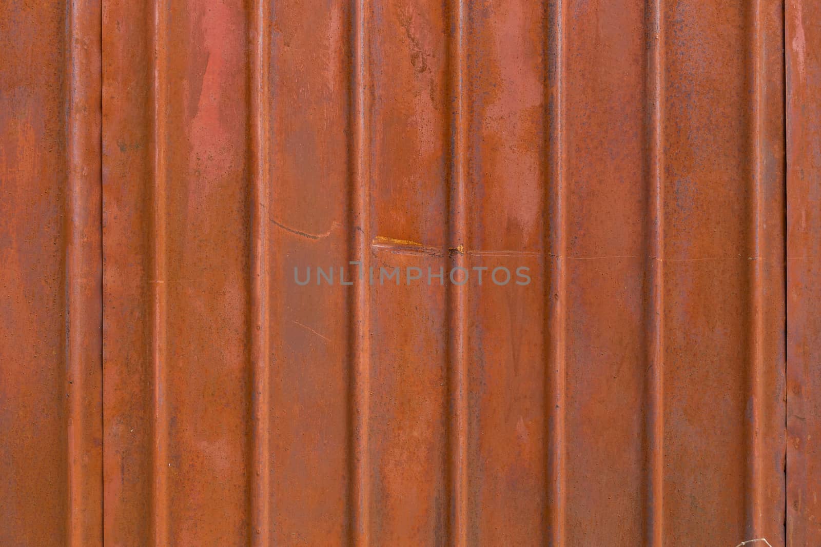 flat ribbed matte brown painted steel surface with light rust spots by z1b