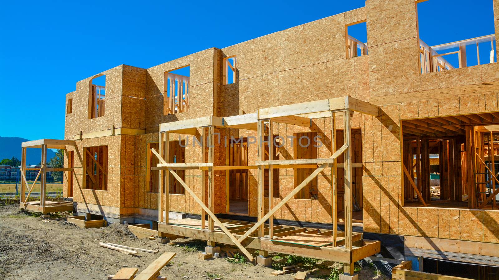 New family house is under construction on sunny day