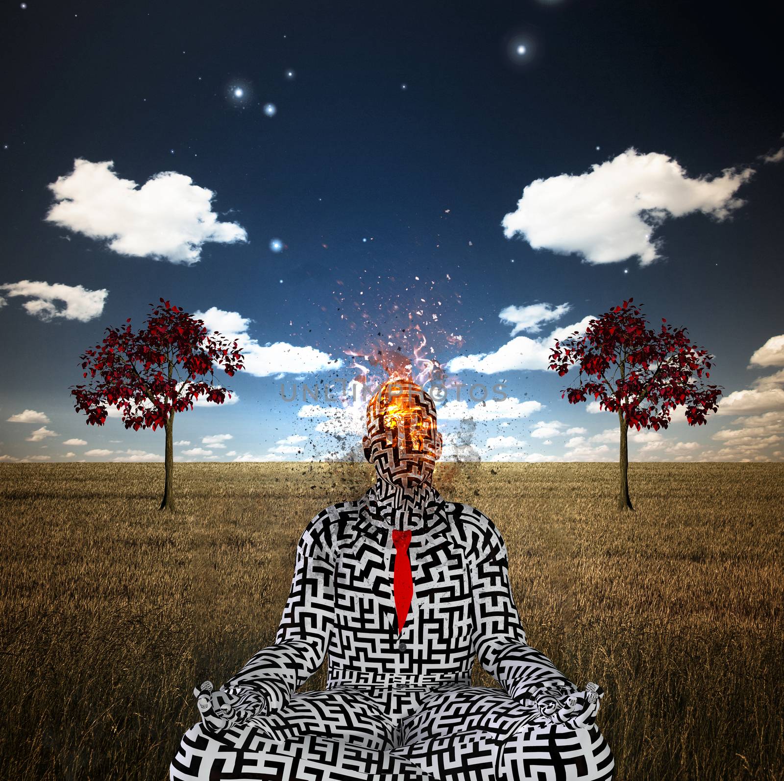 Surrealism. Burning man wearing maze pattern suit sits in lotus pose. Two red trees in the field