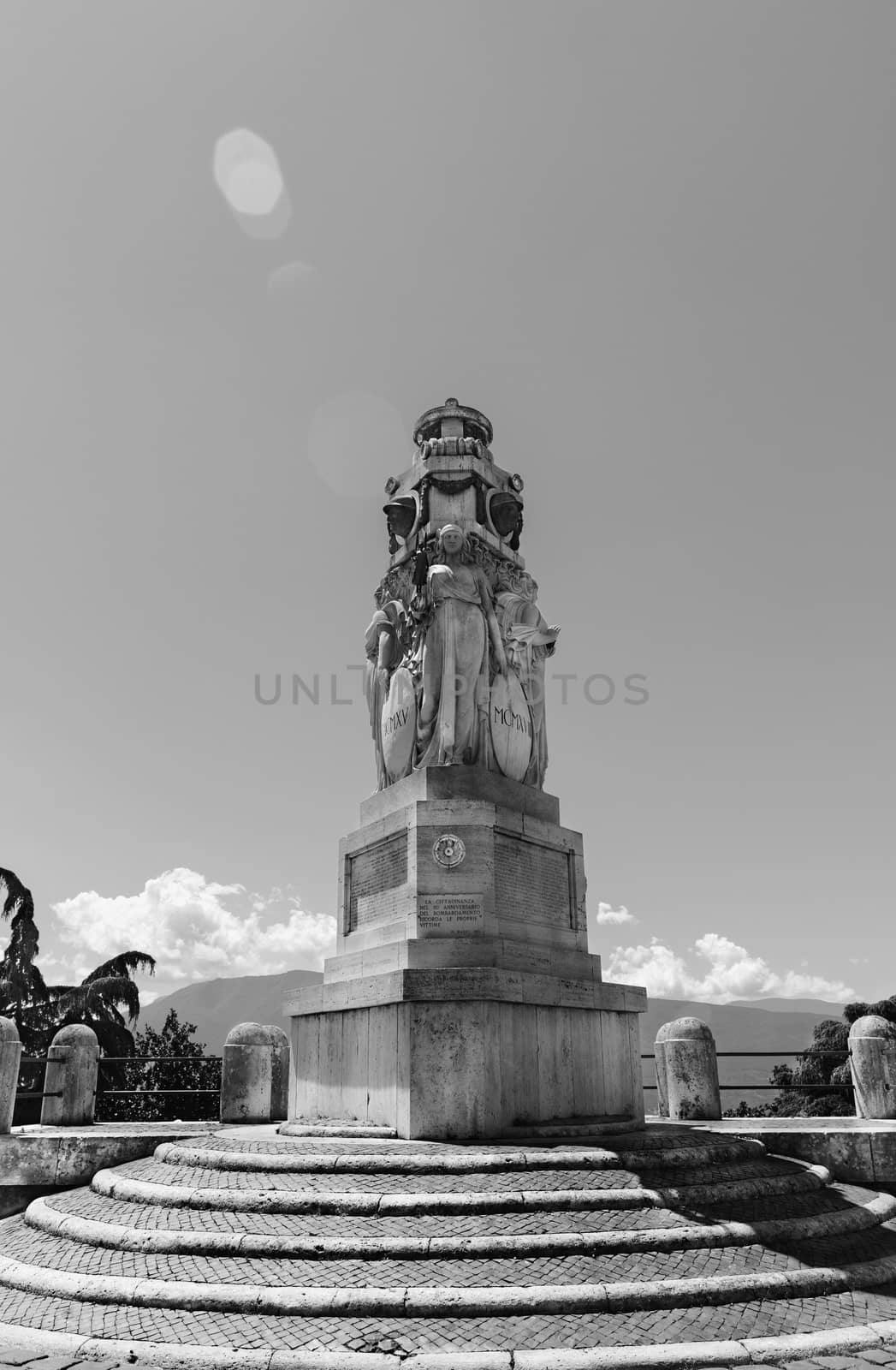 The war memorial  by Volterrani Volterrano inaugurated in 1931 is placed in Cavour square -ANAGNI -ITALY to commemorate the fallen soldiers during the First World War with symbols of Victory , Glorification and Remembrance , the top faces remember fallen soldiers -black and white photography