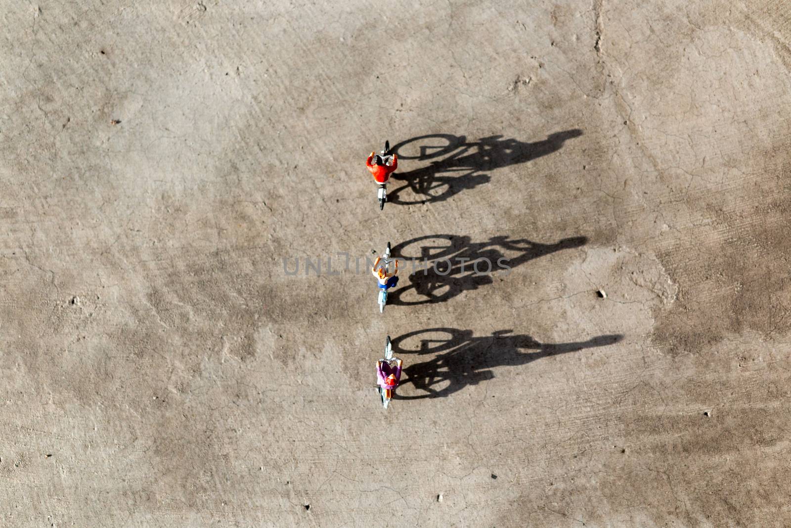 Miniature people : Travelers riding bicycle  by sirichaiyaymicro