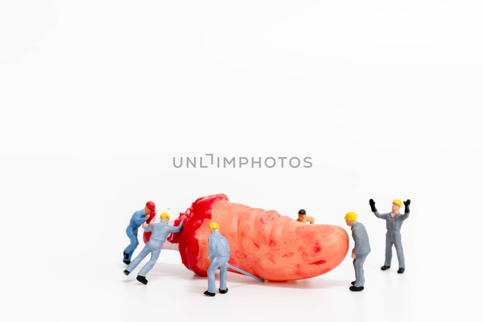 Miniature people : Worker team created Halloween Party Props Decoration on a white background