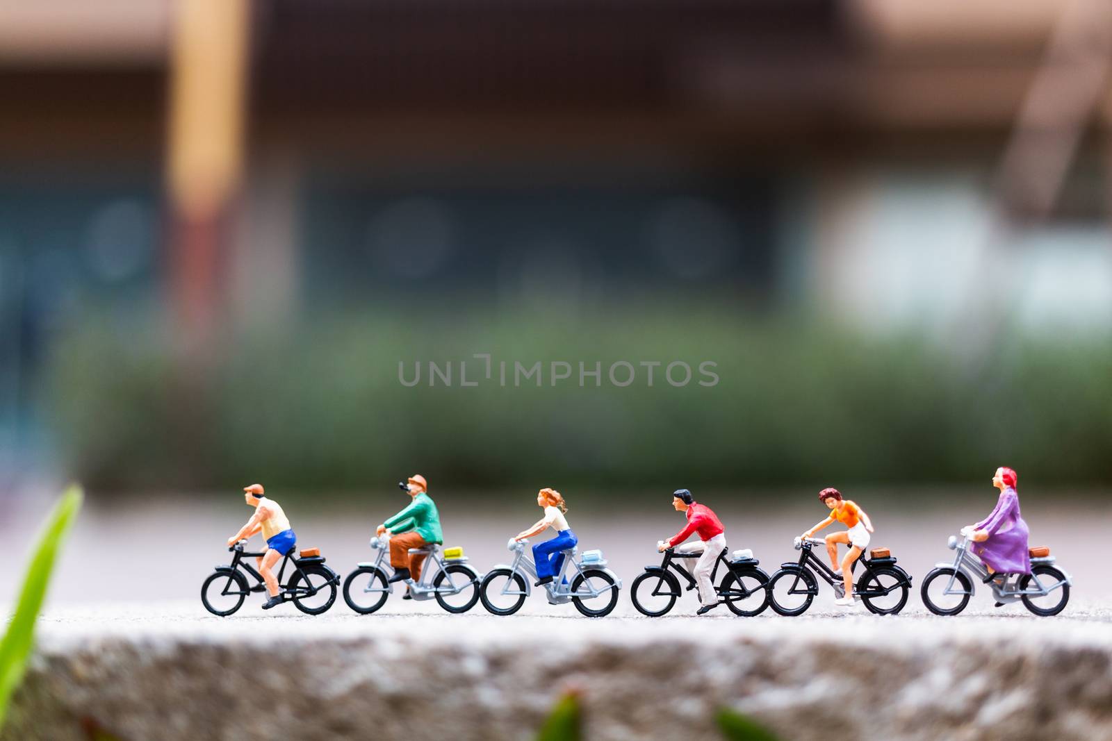 Miniature people travellers with bicycle in the park , Healthy lifestyle concept