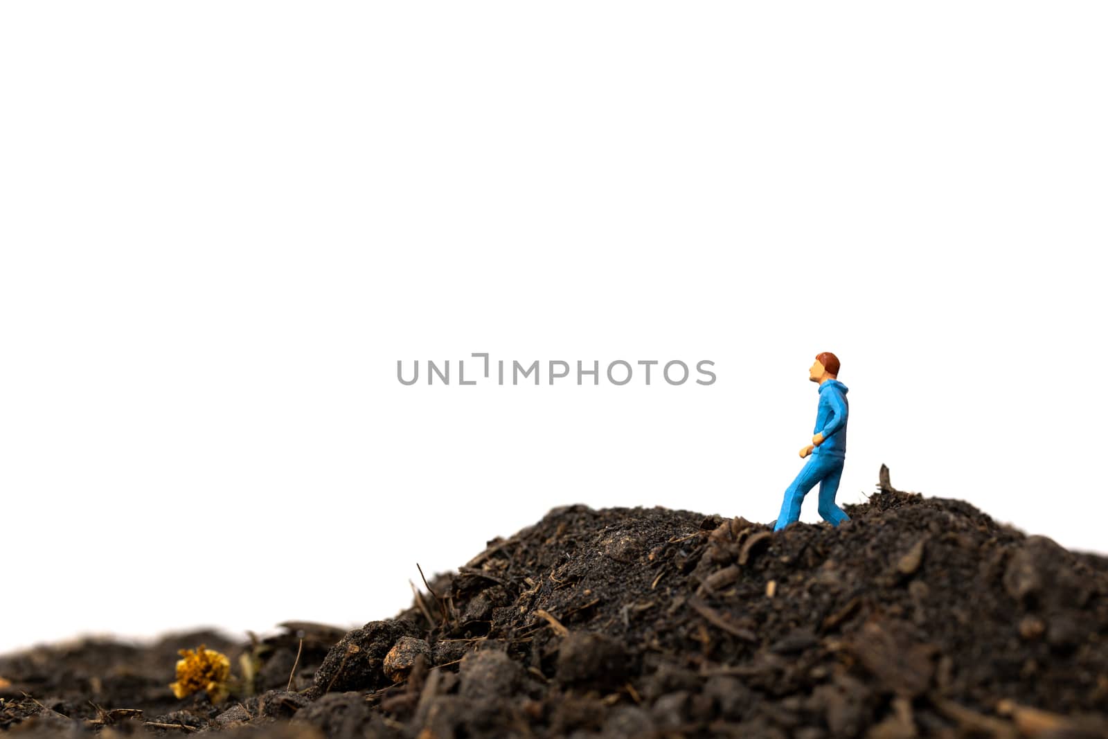 Miniature people : Man Running on The ground  isolated on white background , Run for health concept.
