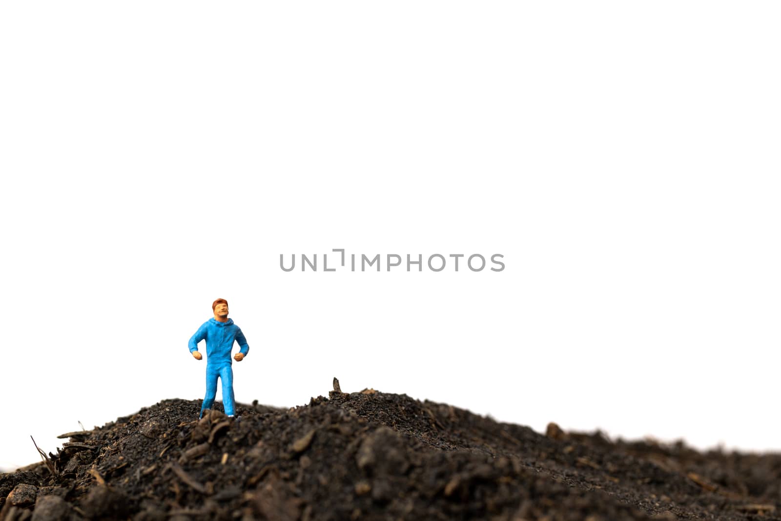Miniature people : Man Running on The ground  isolated on white background , Run for health concept.