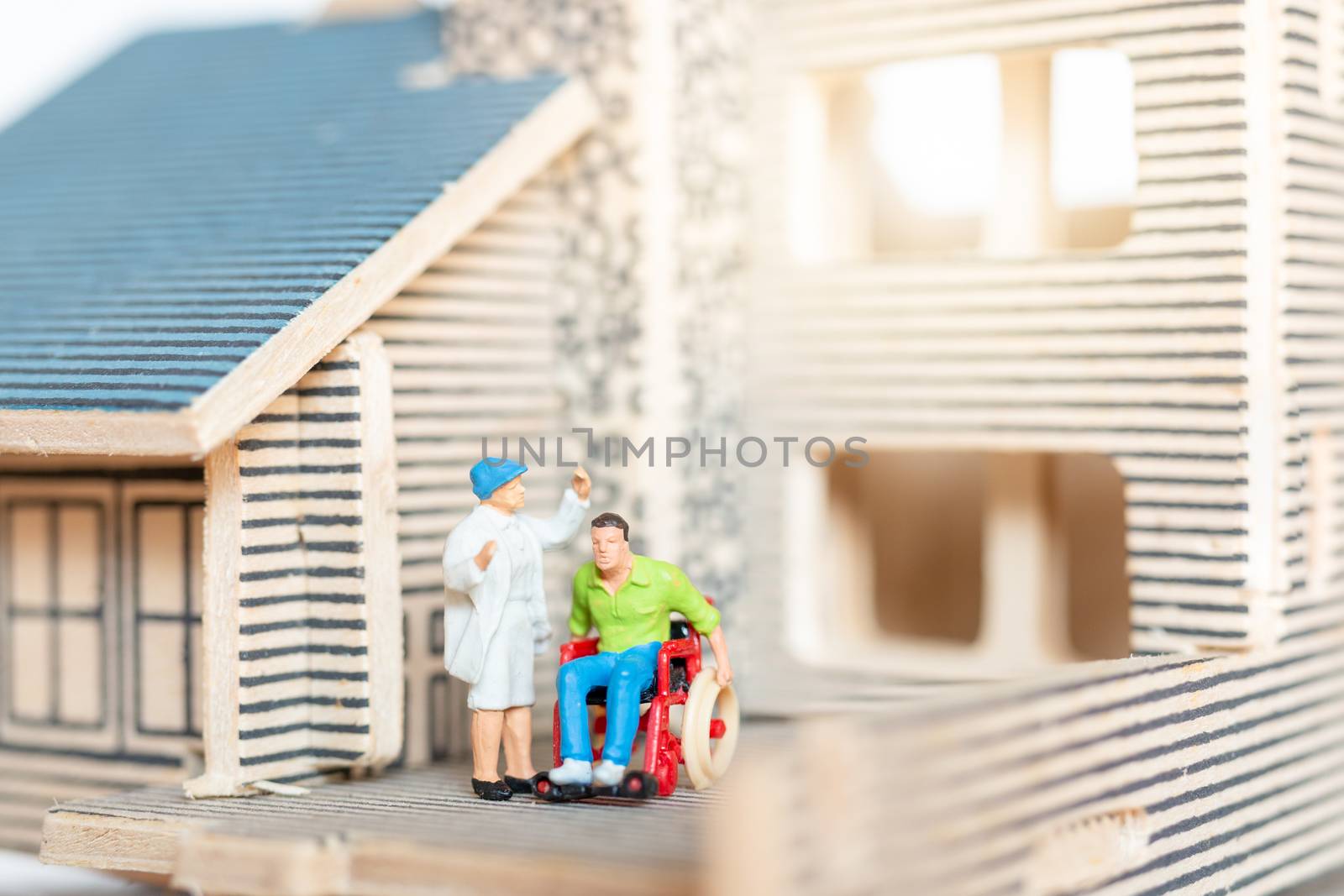 Miniature people stay at home doing self-quarantine , stay home concept