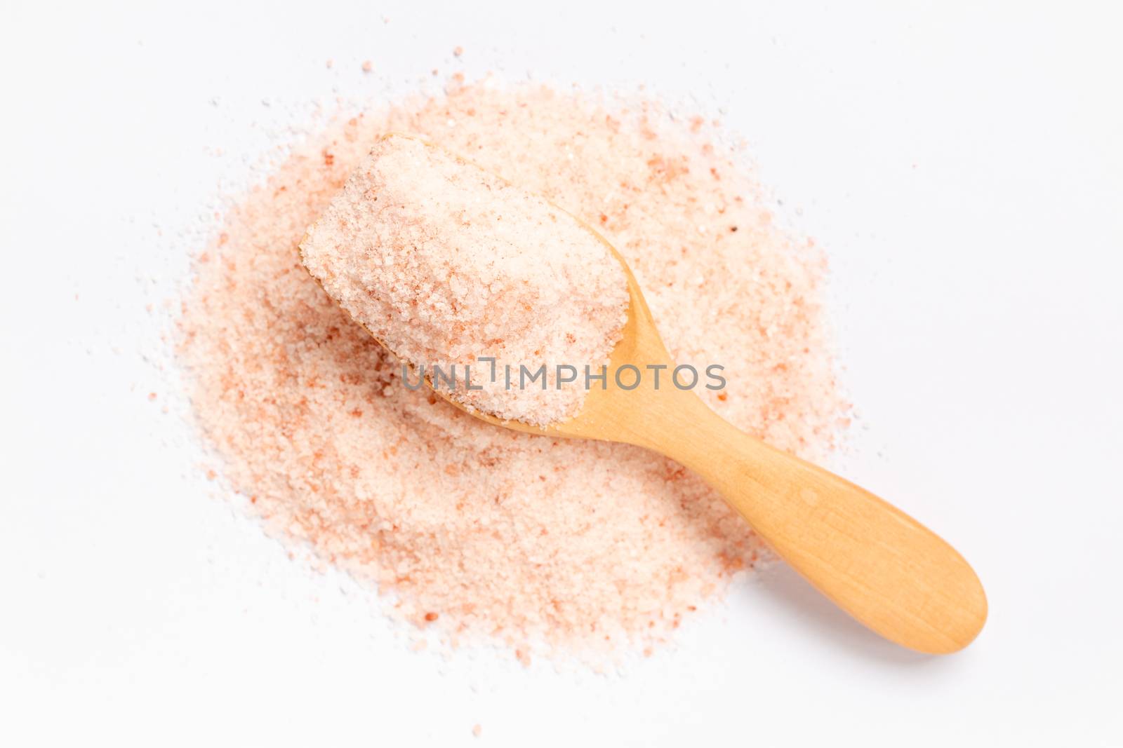 Pink salt , Himalayan salt on white background