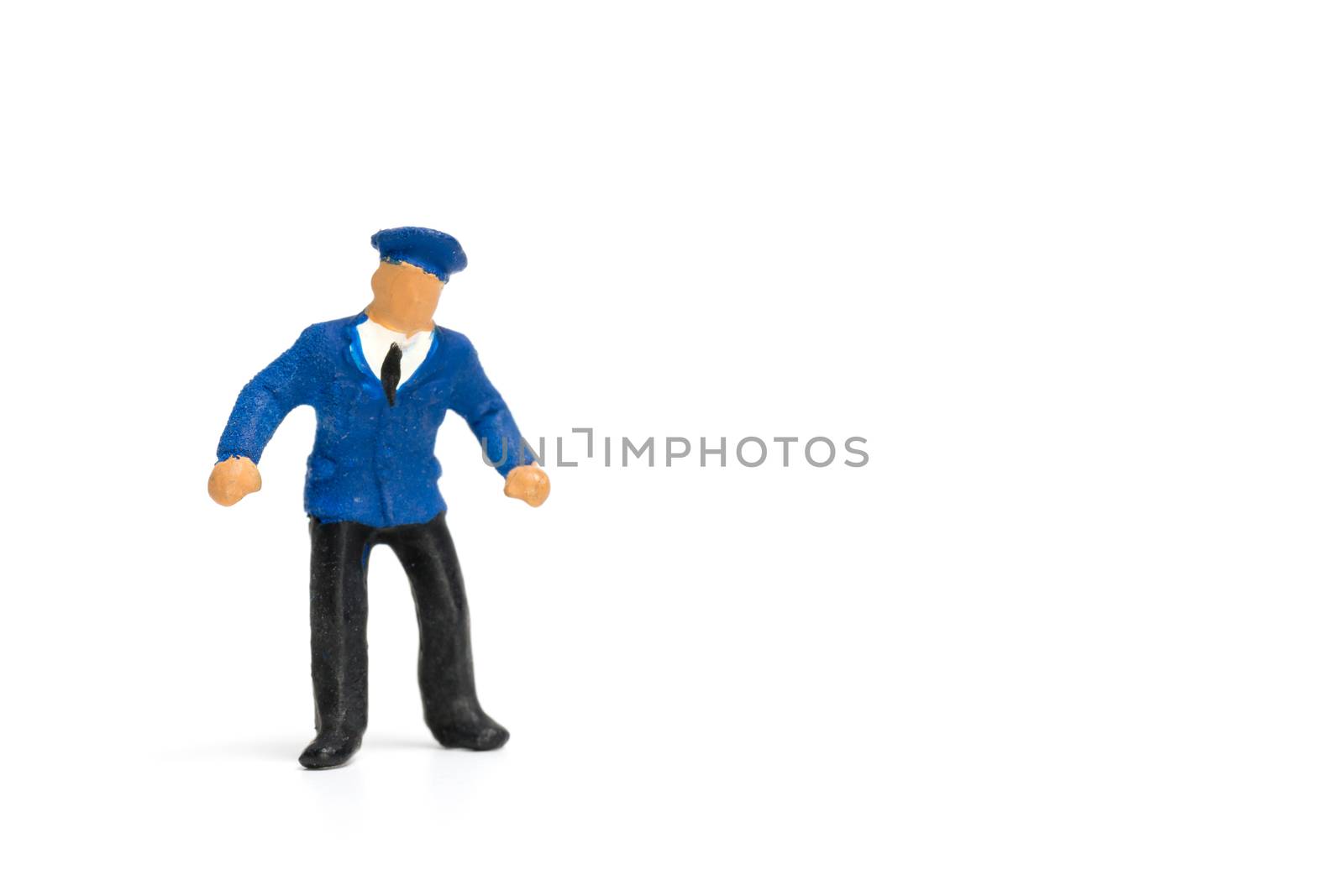 Miniature people : Policeman standing isolate on white background