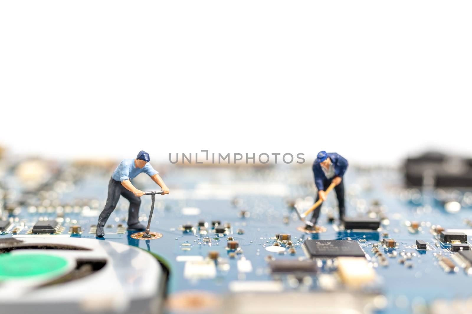 Miniature people working on cpu board, Technology concept