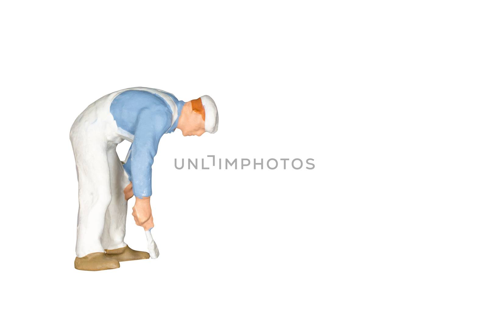 Miniature people : Painter holding a brush isolated on white and clipping path