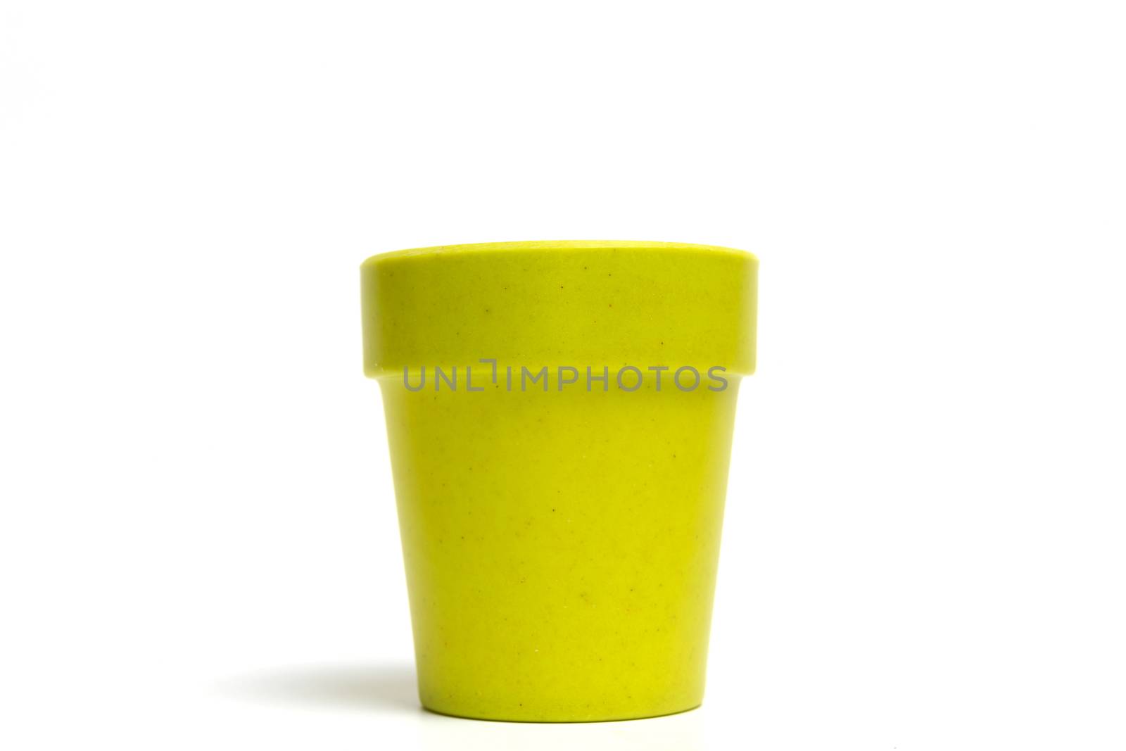 Recycled materials biodegradable tree pot isolated on a white background