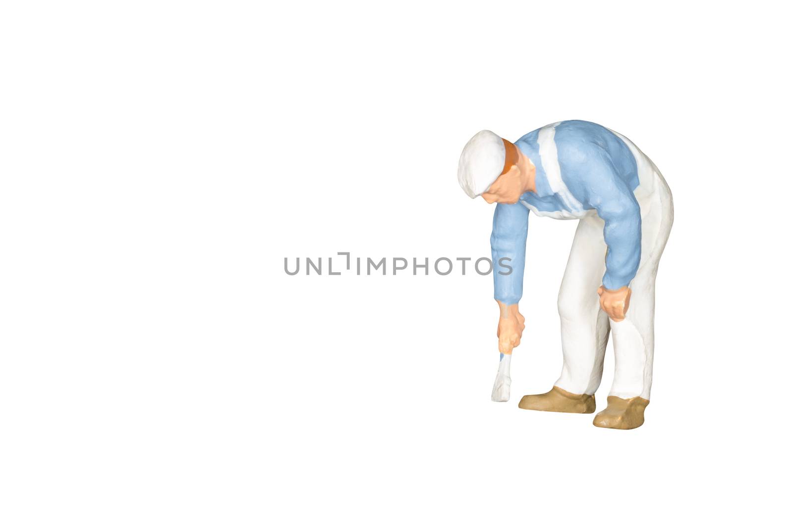 Miniature people : Painter holding a brush isolated on white and clipping path