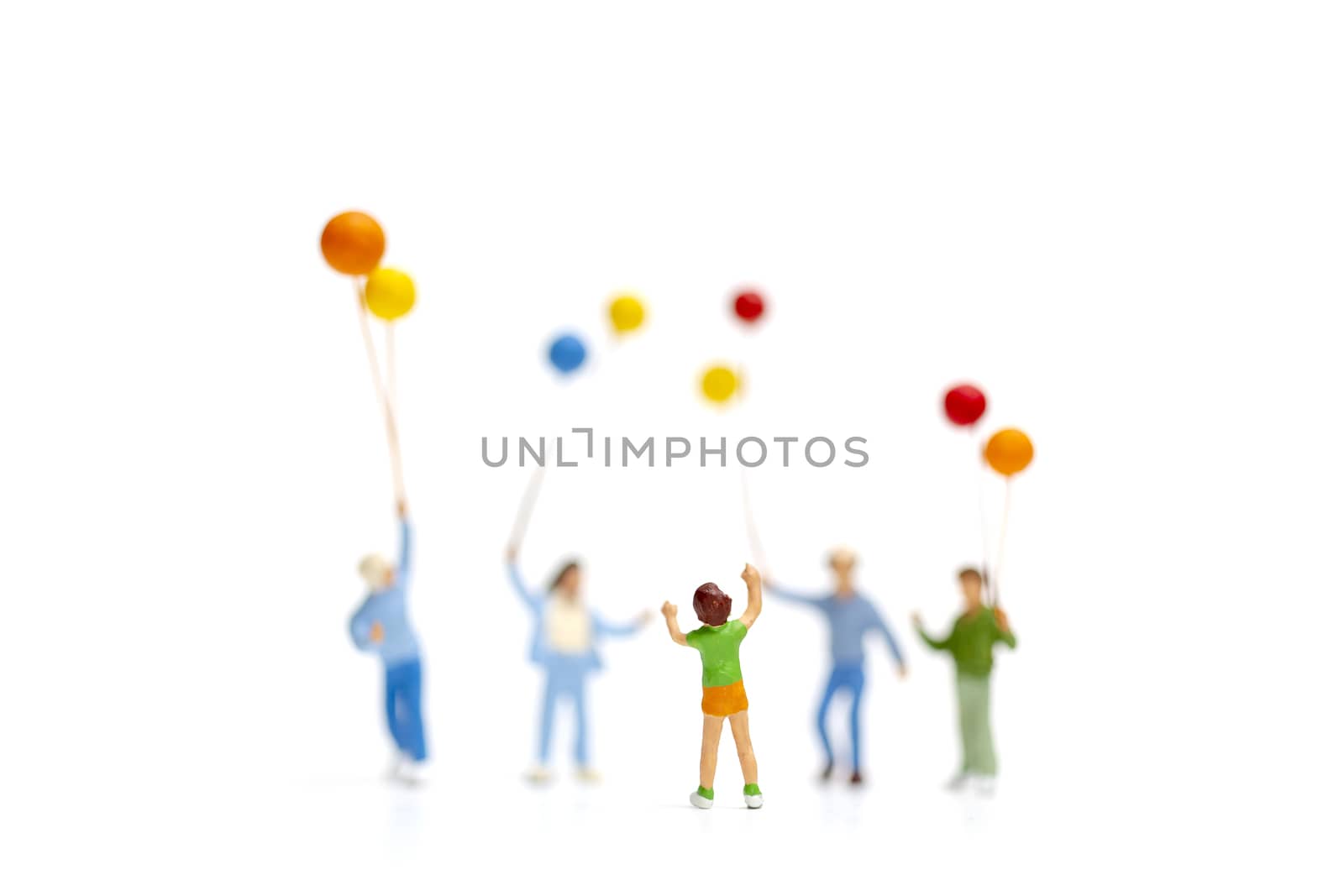 Miniature people children holding balloon isolate on white background, happy family day concept.