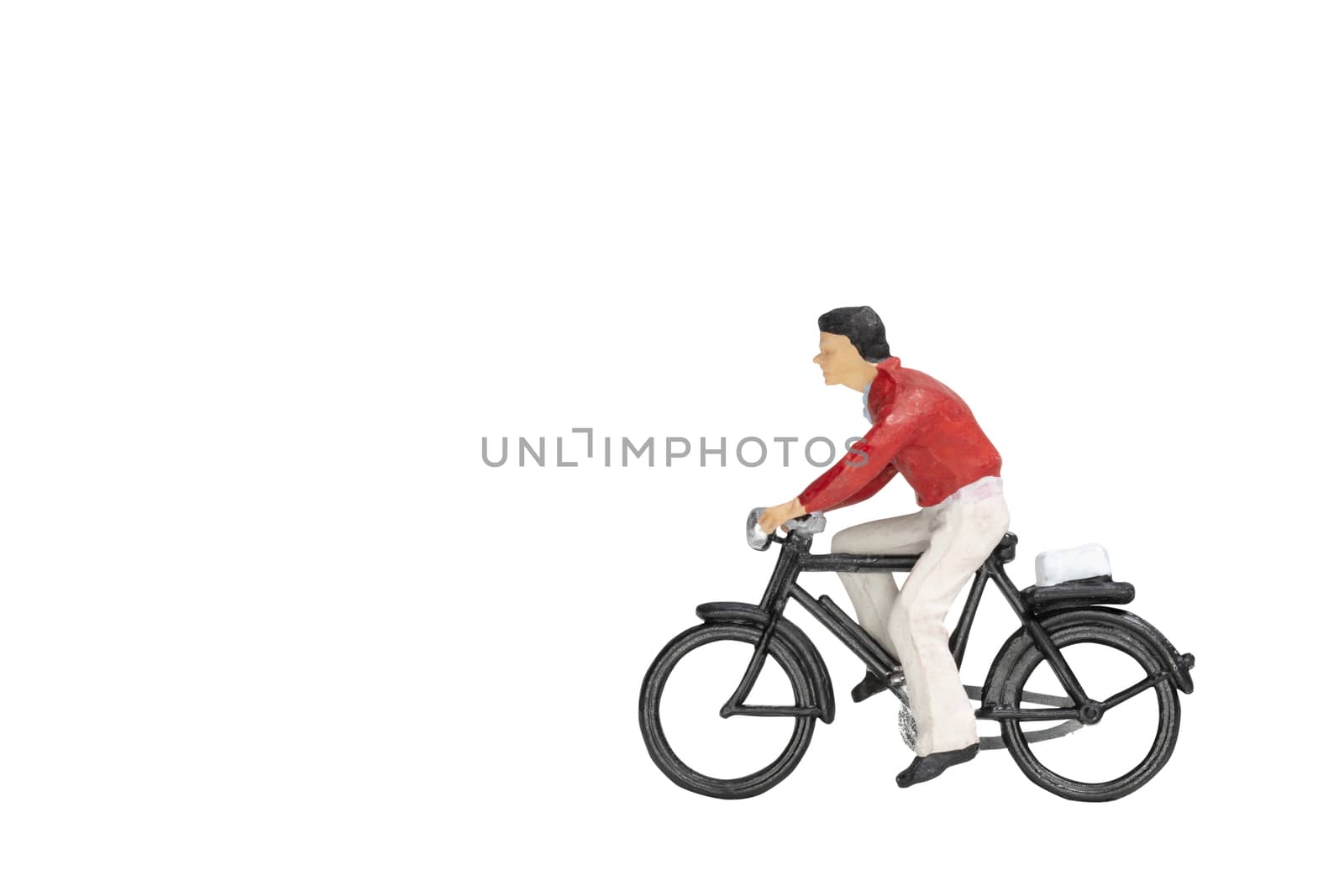 Miniature people travellers with bicycle isolate on white background with clipping path