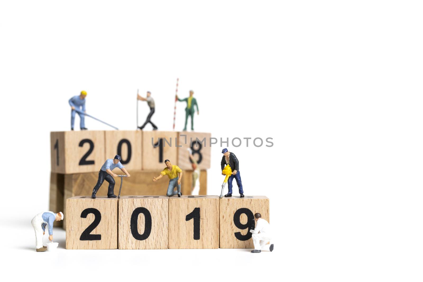 Miniature worker team painting number 2019 on white background , Happy new year 2019 concept