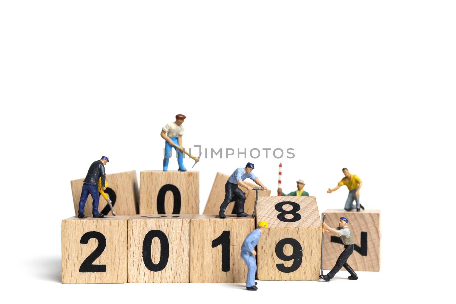 Miniature worker team painting number 2019 on white background , Happy new year 2019 concept