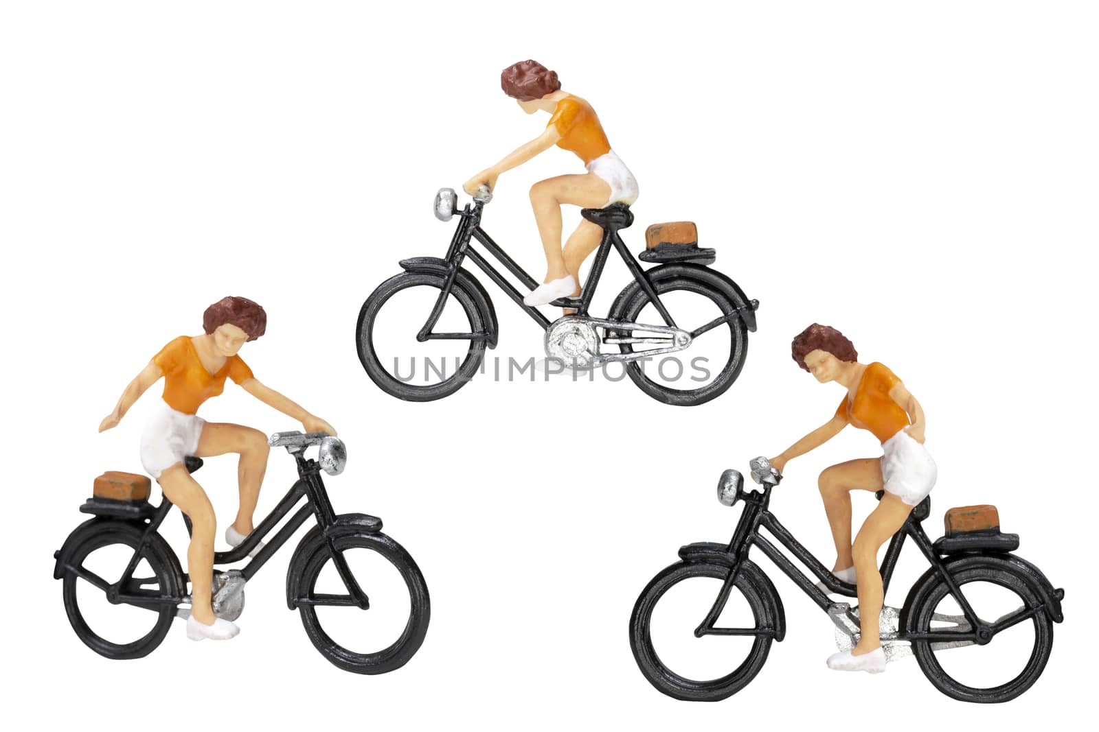 Miniature people travellers with bicycle isolate on white background with clipping path