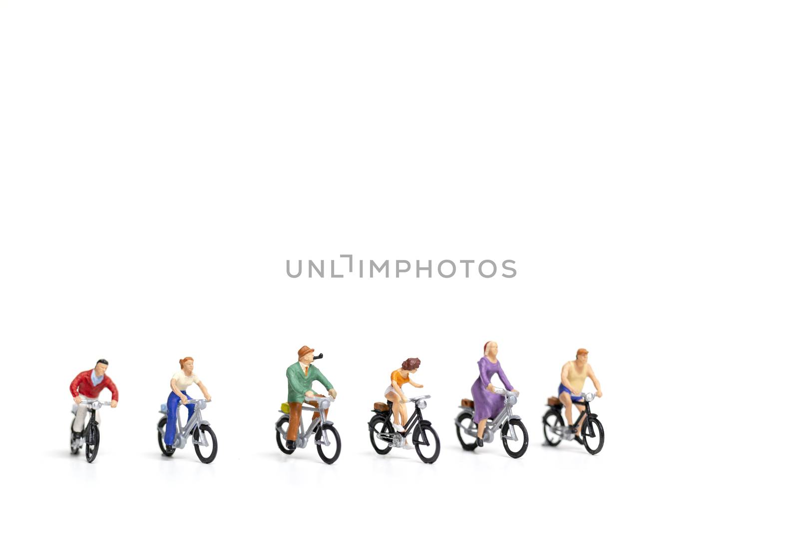 Miniature people : Friend Group ride bicycle  isolate on white background , Travel concept