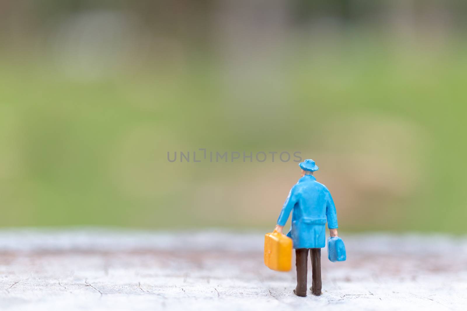 Miniature people : Traveler walking on street  , Travel and Adventure concepts.