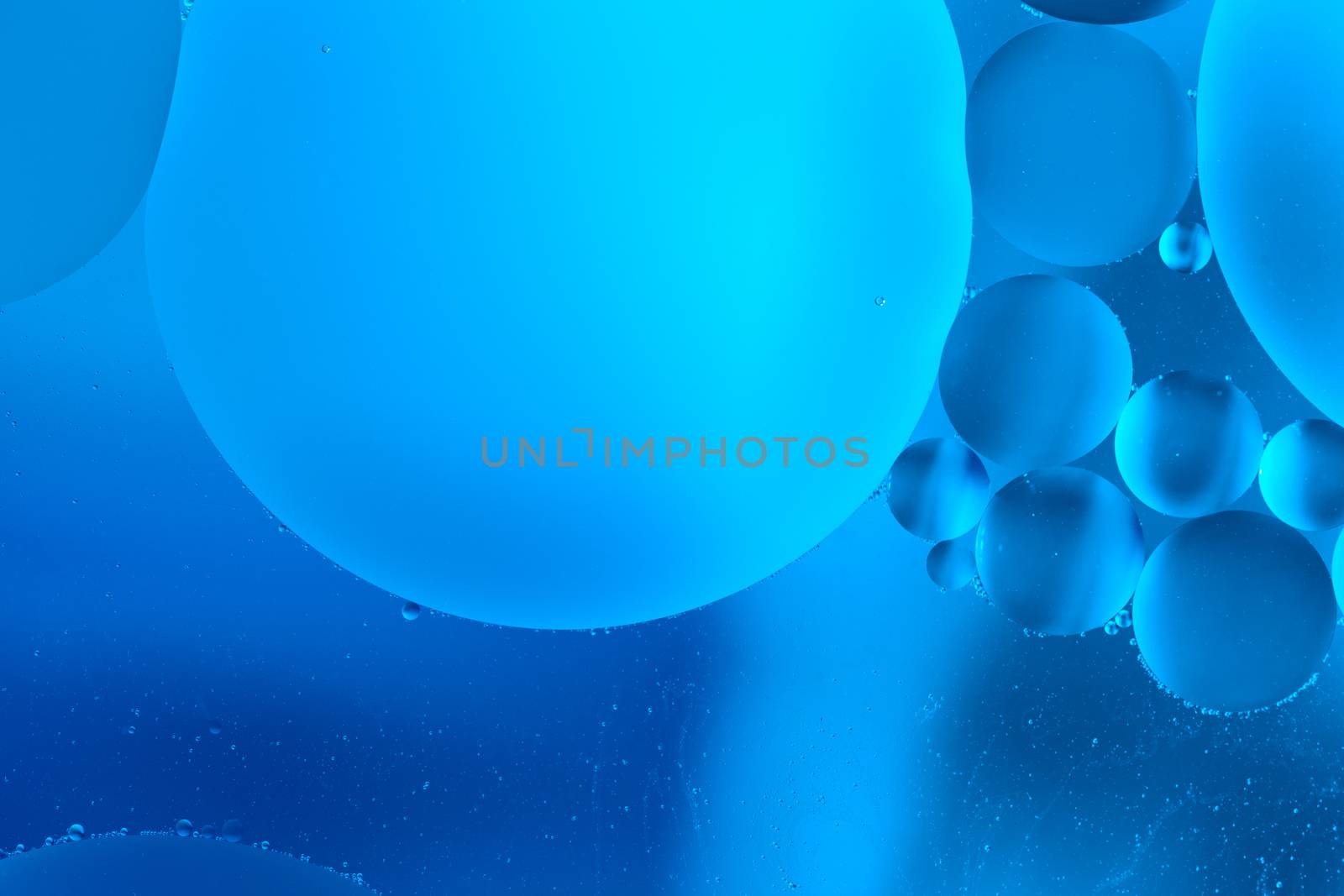 abstract blue oil in water macro artistic background