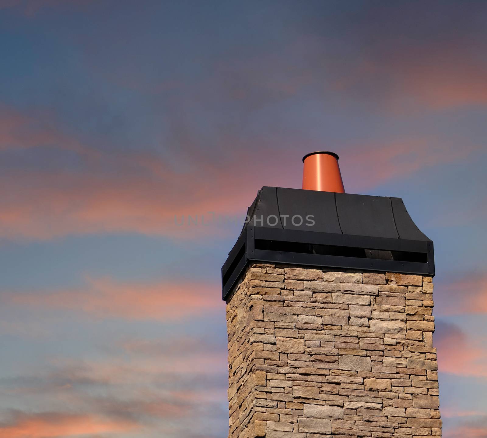 Stone Chimeny with Metal Cap at Dusk by dbvirago