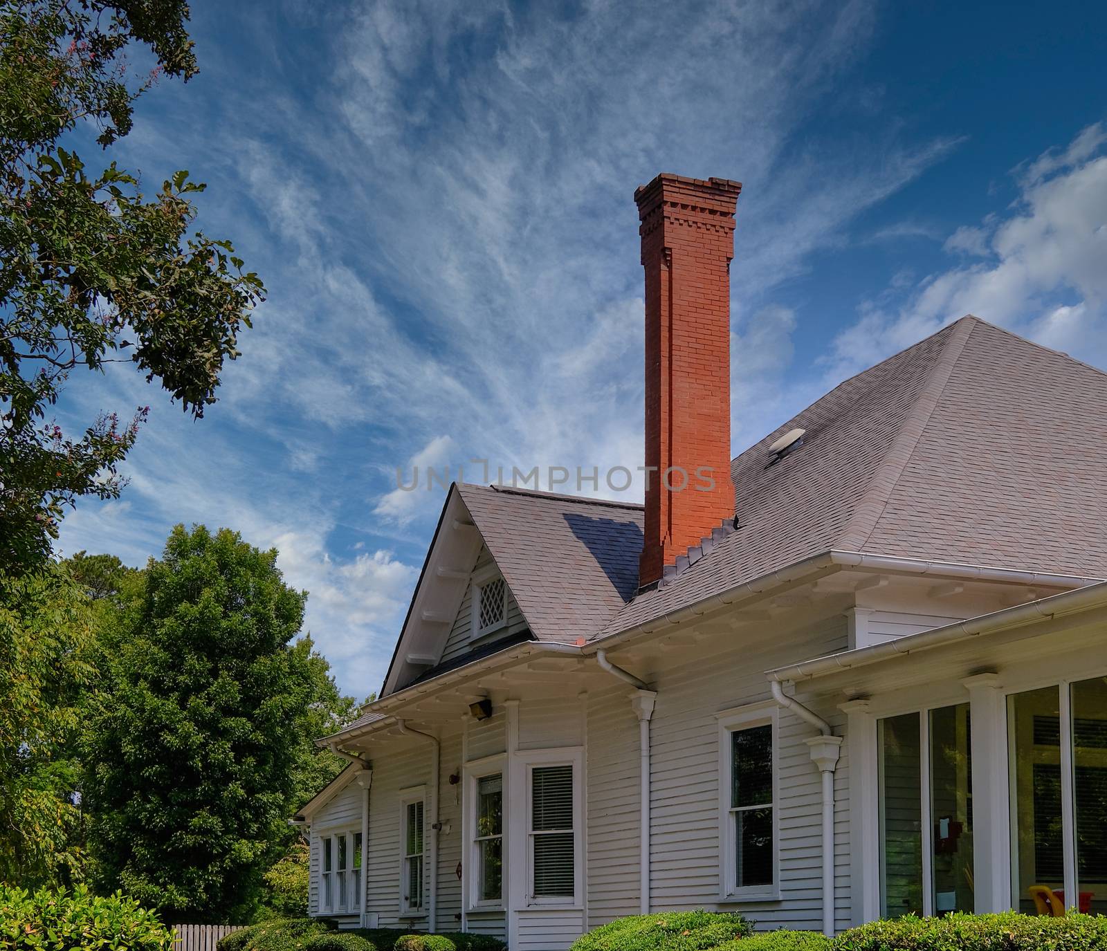 Tall Brick Chimney in Farmhouse in Rural area
