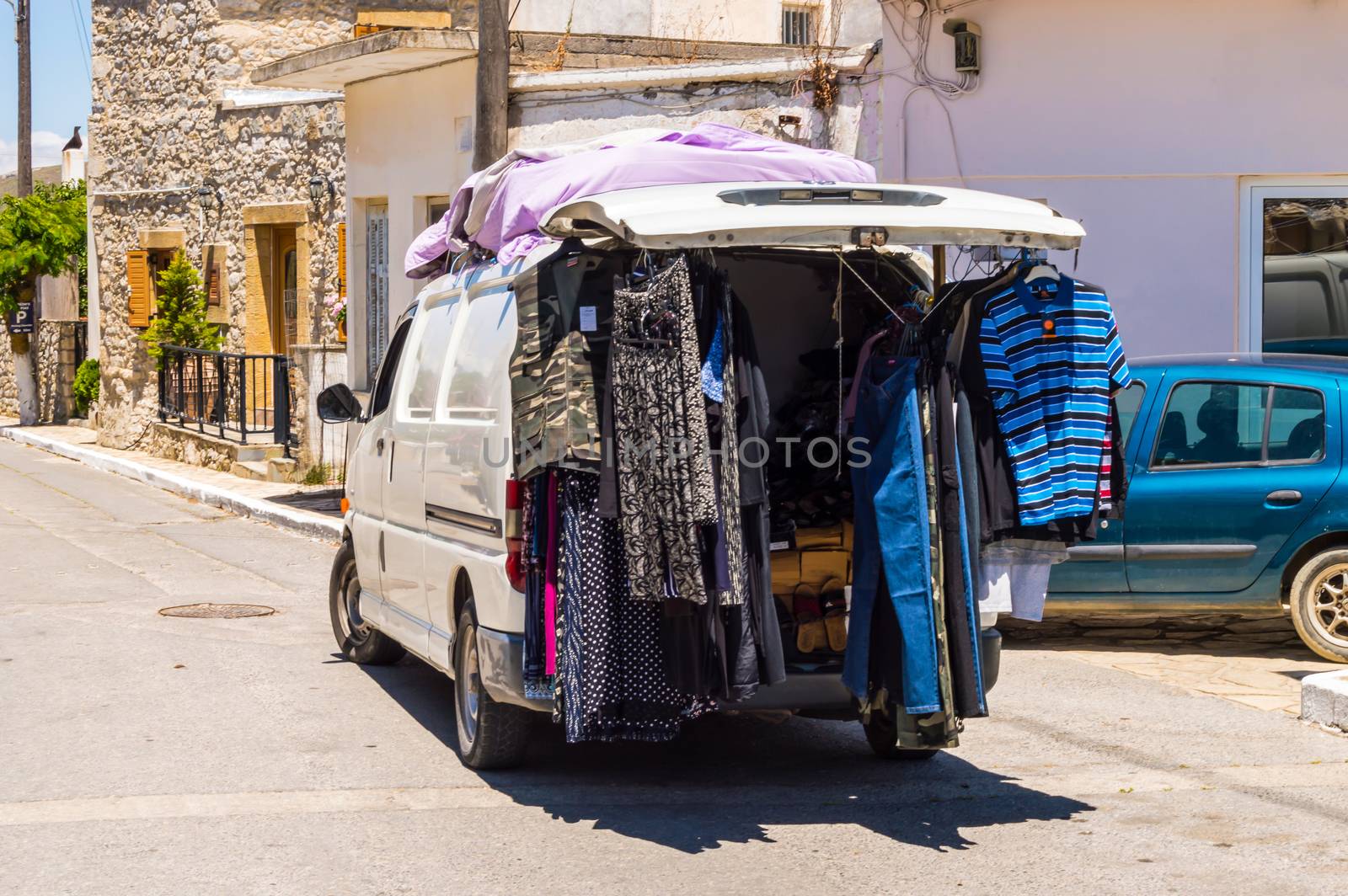 Pickup truck serving as a clothing store in a village in Crete