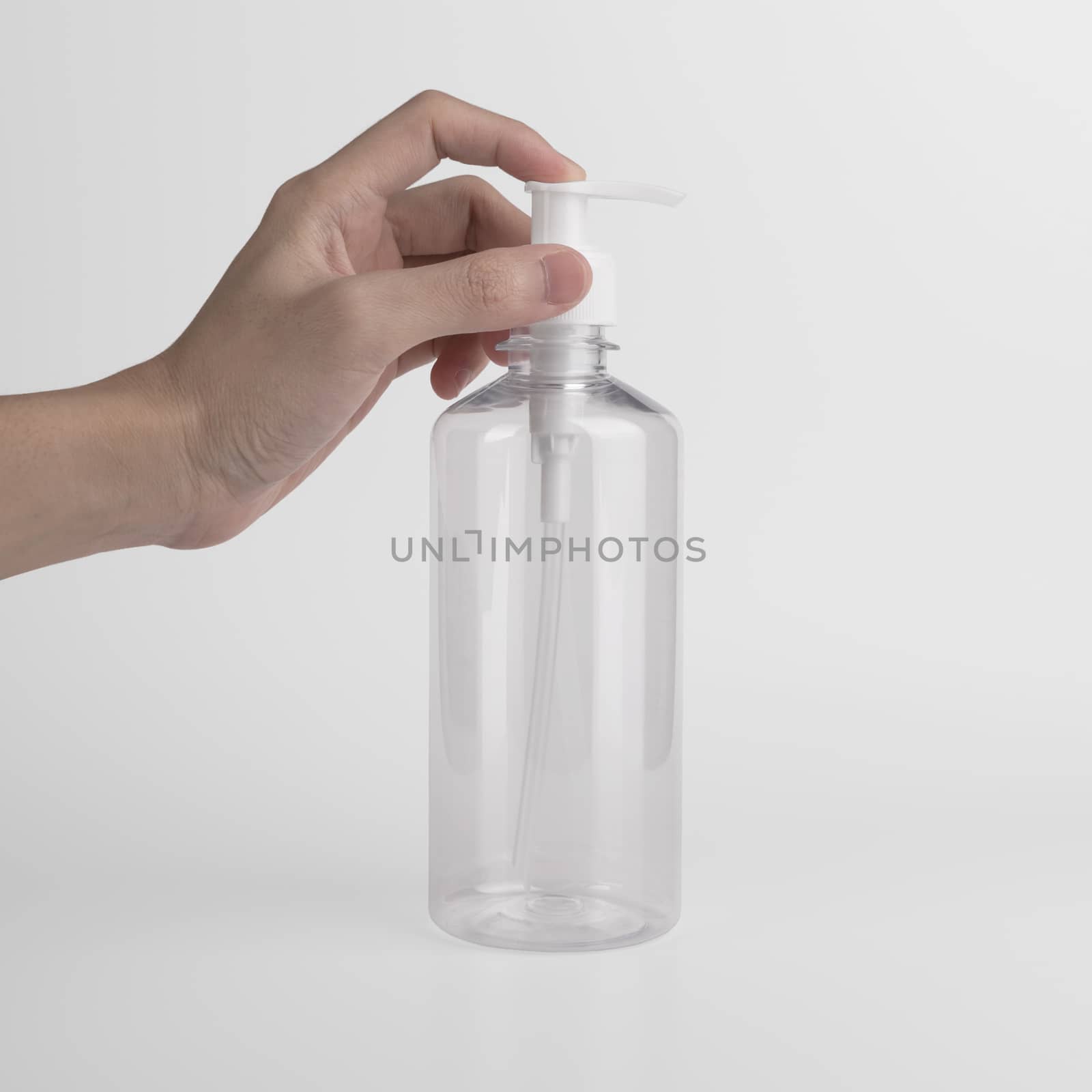 Blank Mockup plastic transparent bottle with dispenser airless pump using label and ads for Gel,soap,Alcohol,cream and cosmetics. by barameeyay