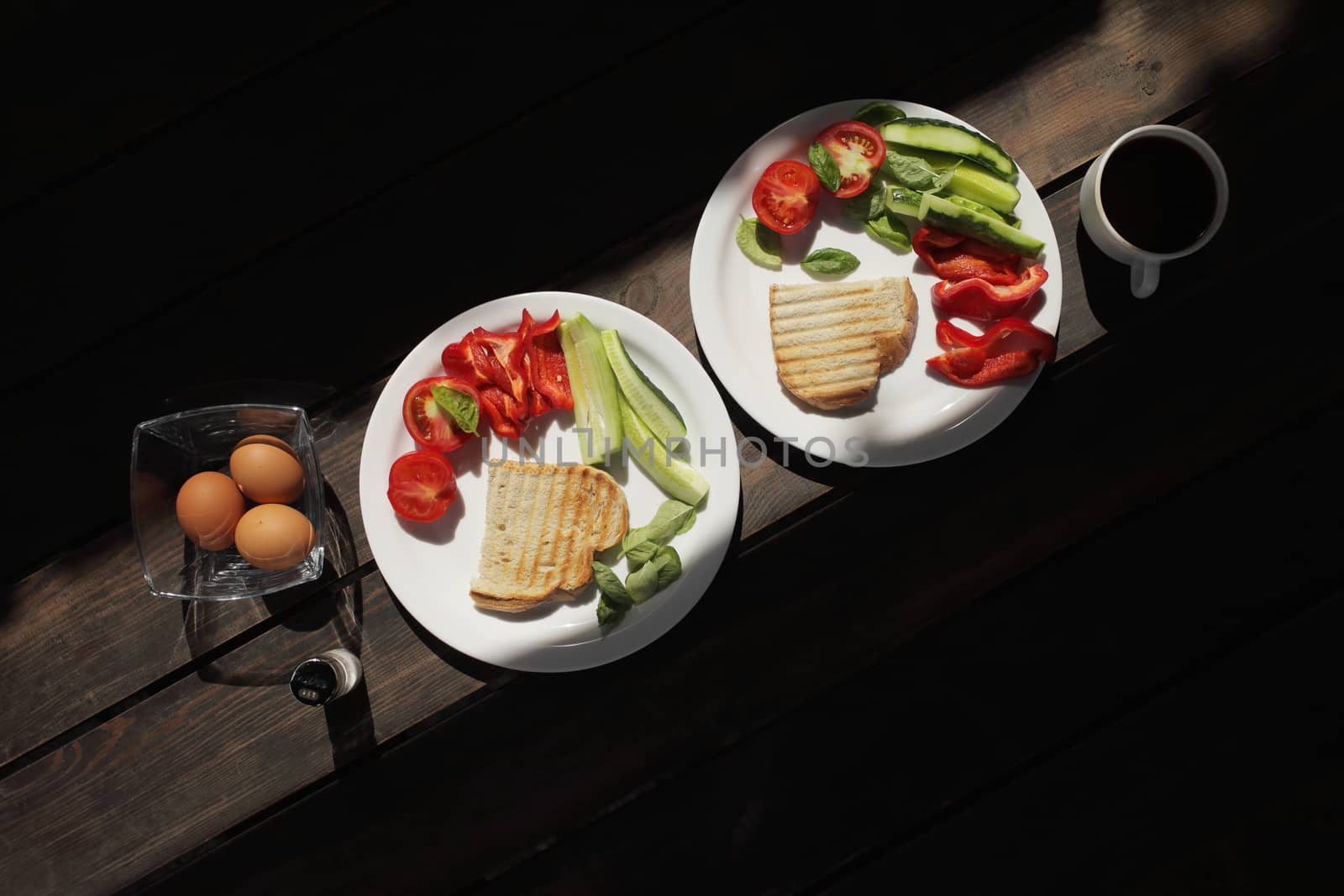 Healthy organic vegetable breakfast, tomato toast salad basil egg coffee by selinsmo