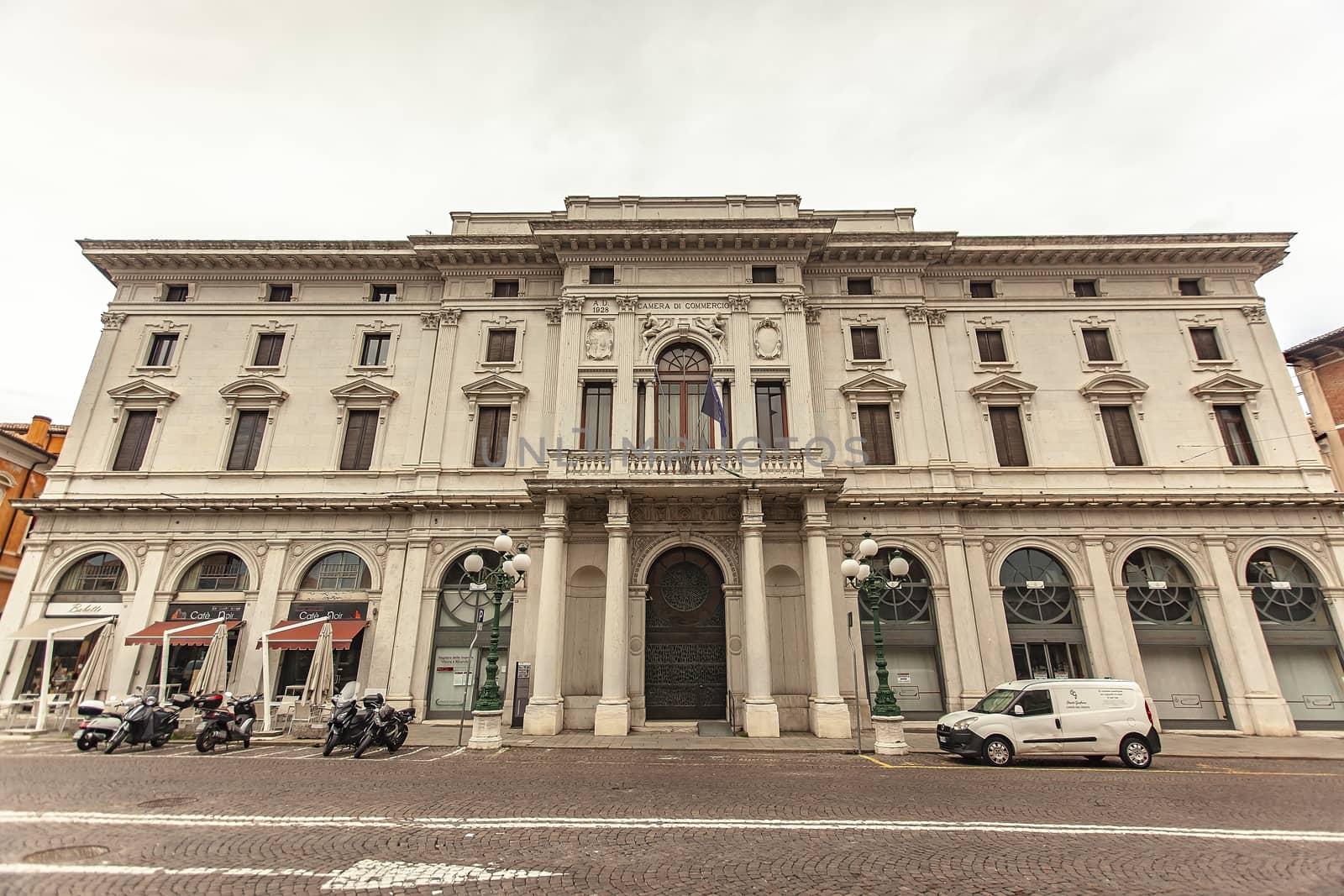 FERRARA, ITALY 29 JULY 2020 : Camera di commercio building facade detail in Ferrara in Italy