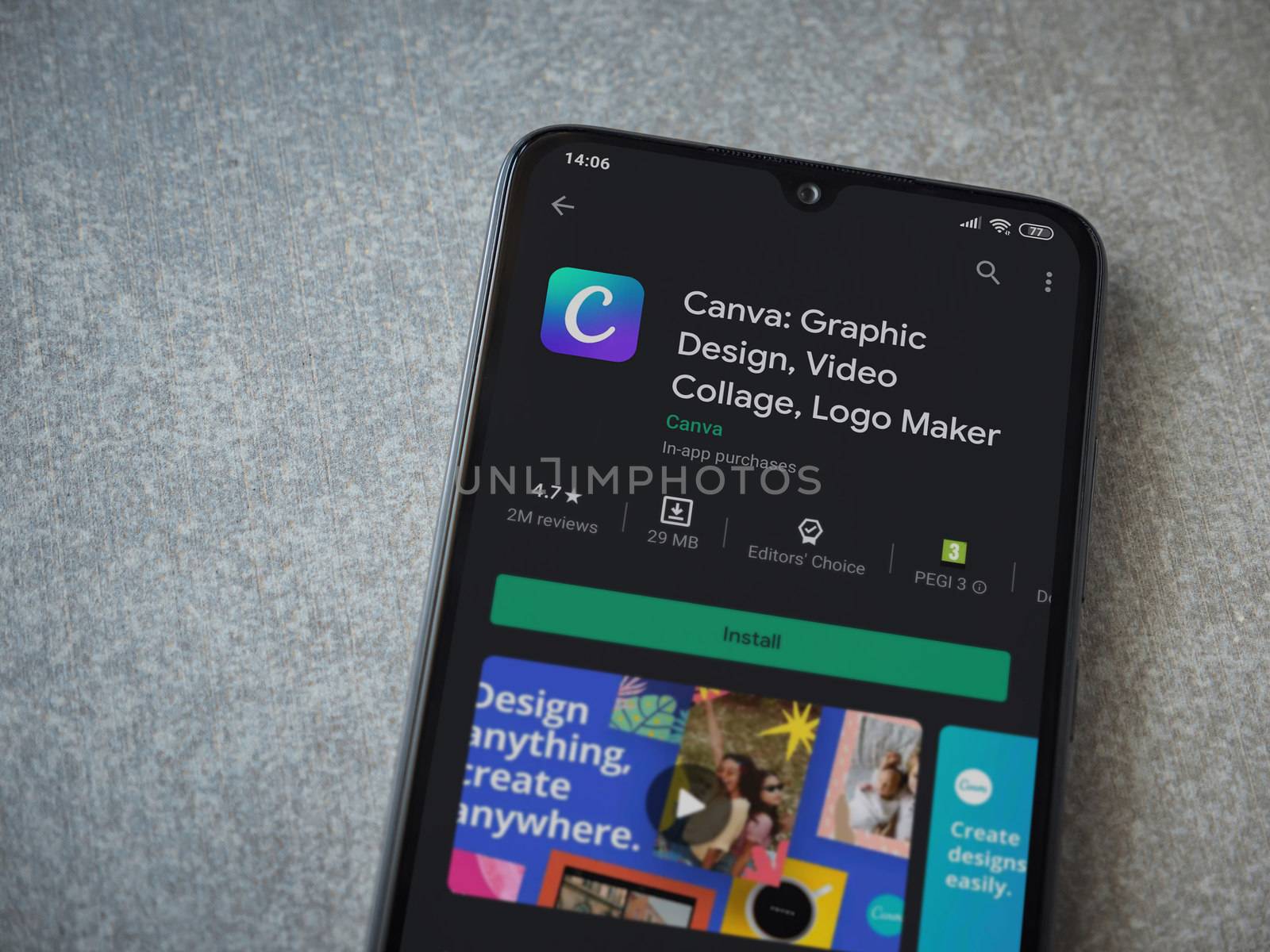 Lod, Israel - July 8, 2020: Canva - Graphic Design app play store page on the display of a black mobile smartphone on ceramic stone background. Top view flat lay with copy space. 