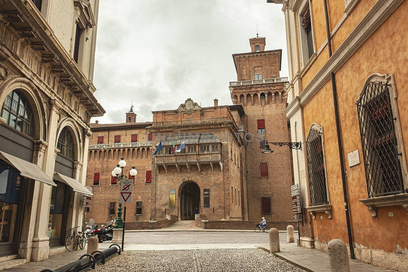 View of the castle of Ferrara from the street in front of it by pippocarlot