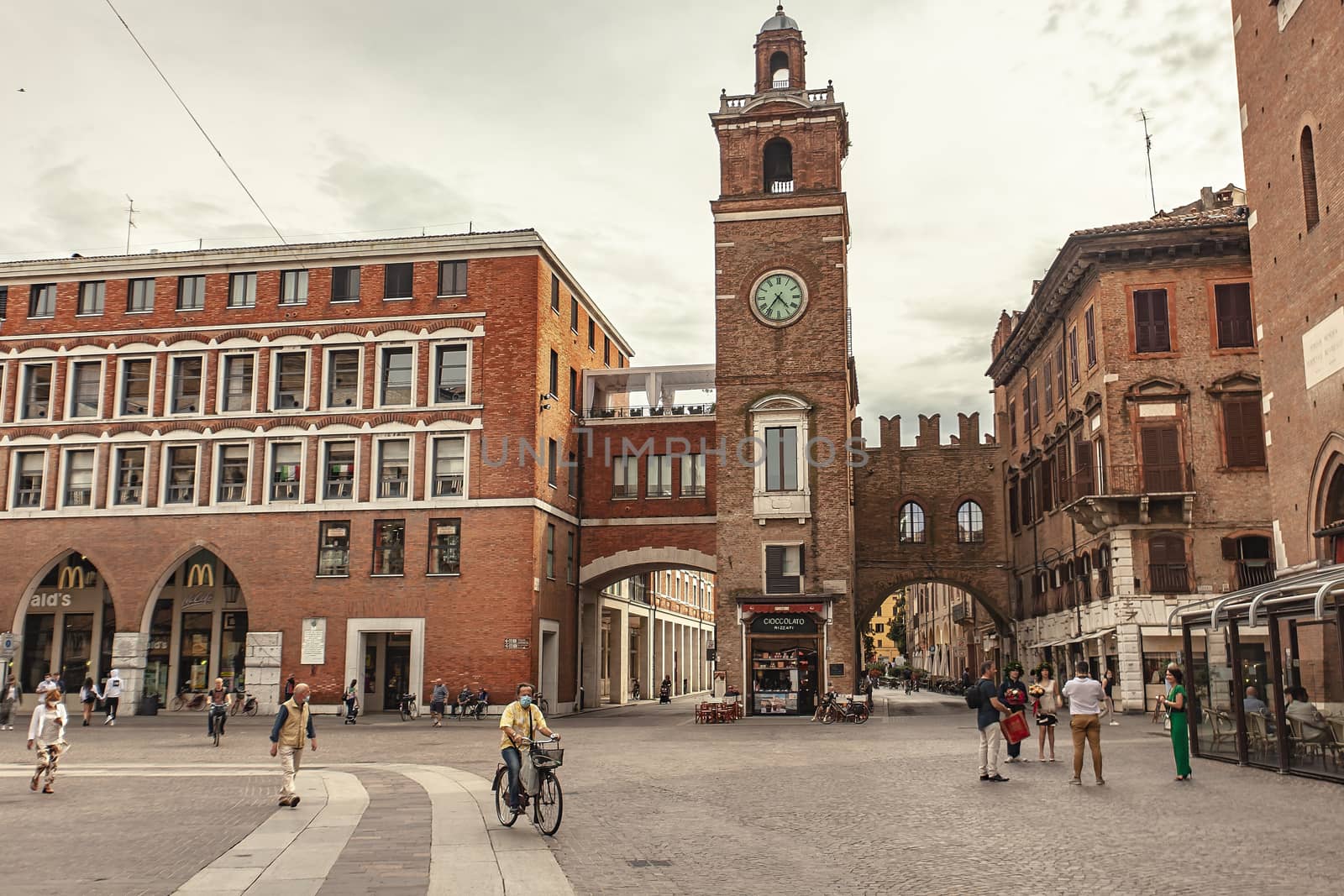 FERRARA, ITALY 29 JULY 2020 : Piazza del Municipio in Ferrara a famous square with clock tower