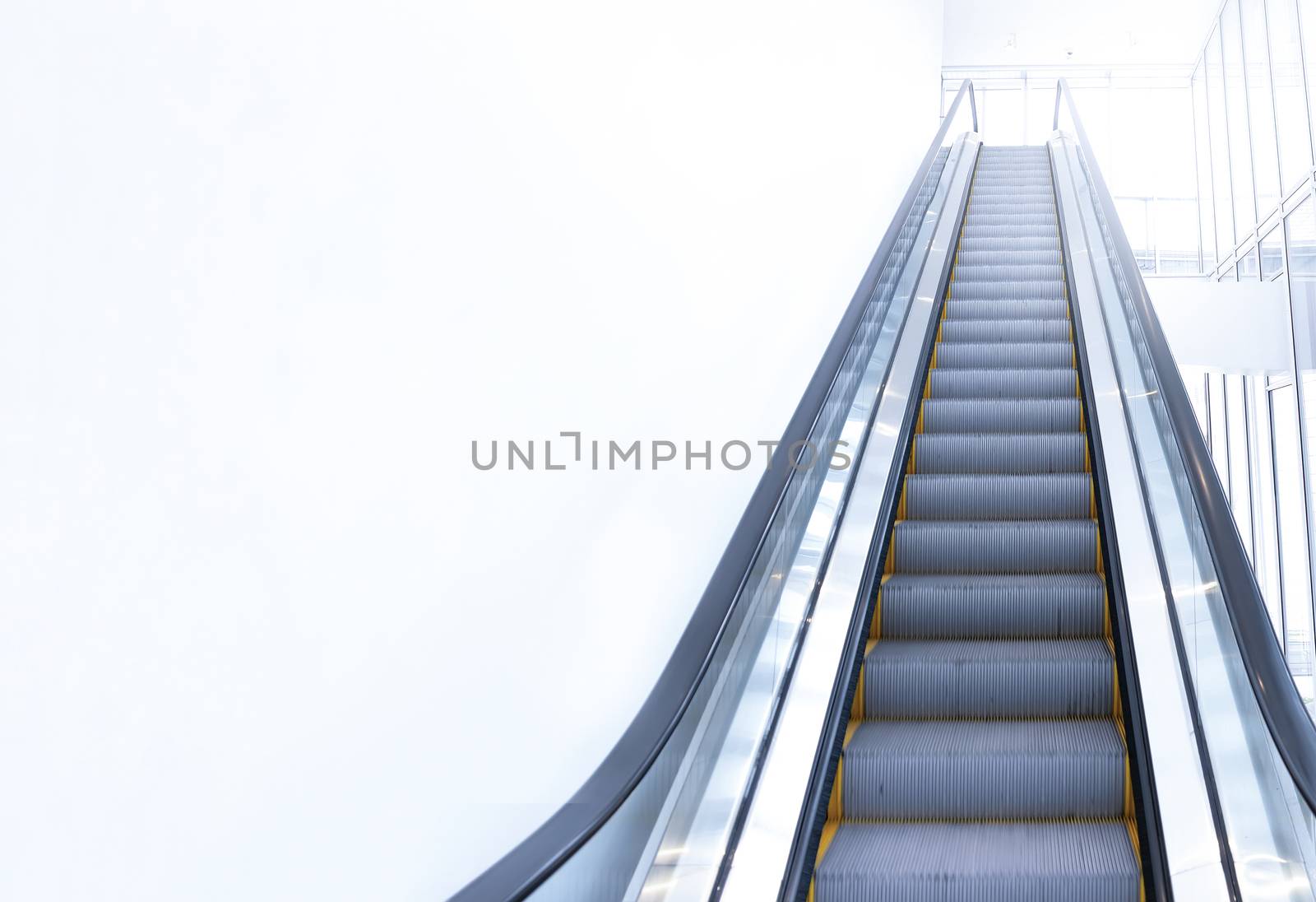 modern escalator view from below. Copy space