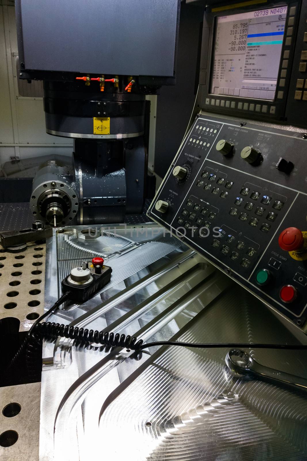 Measuring process with ruby touch probe on large CNC milling machine in jog mode.