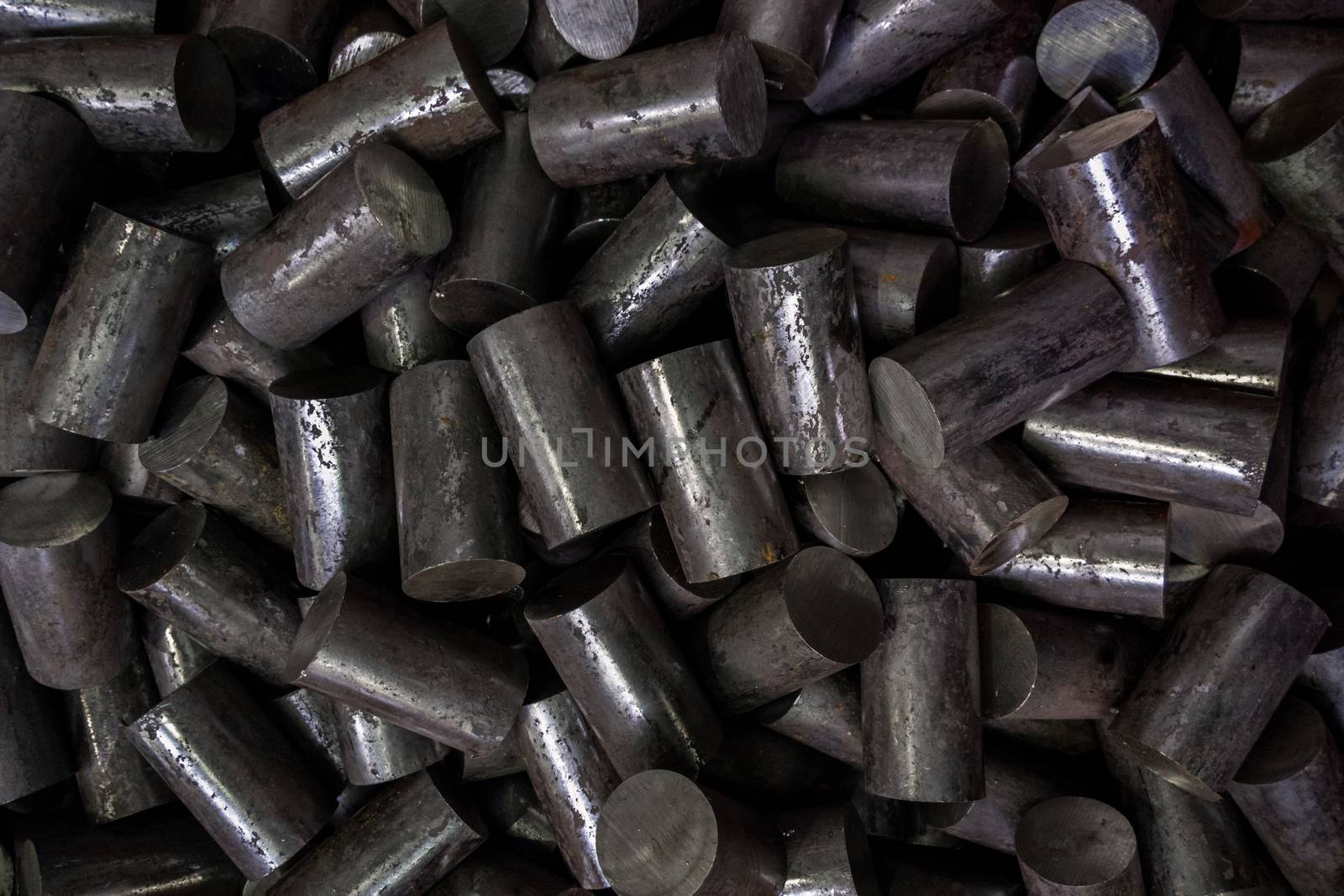 sawed round hot-rolled steel billets made of long products with circle intersection - abstract dark industrial background