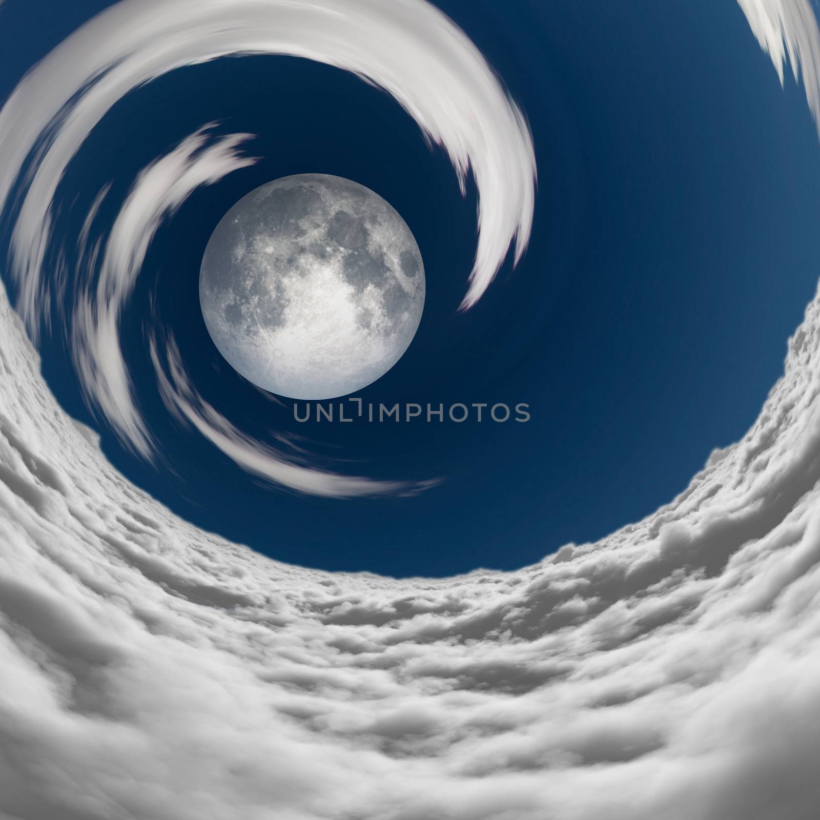 Big full moon in a vortex of clouds