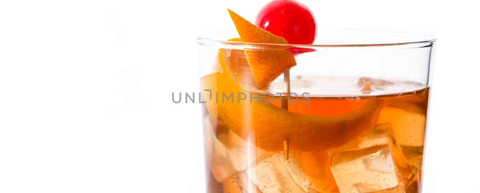 Old fashioned cocktail with orange and cherry by chandlervid85