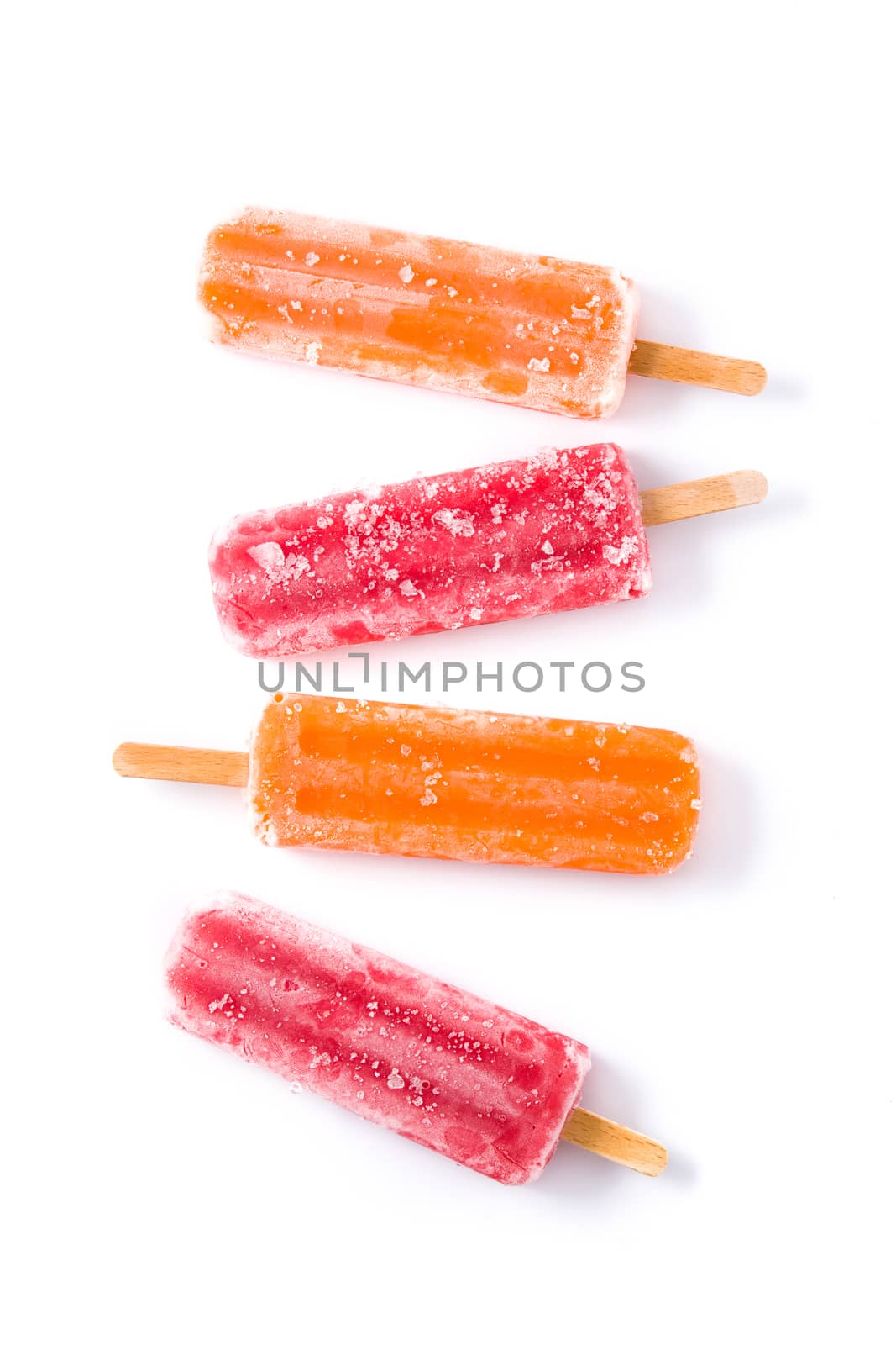 Orange and strawberry popsicles isolated on white background.