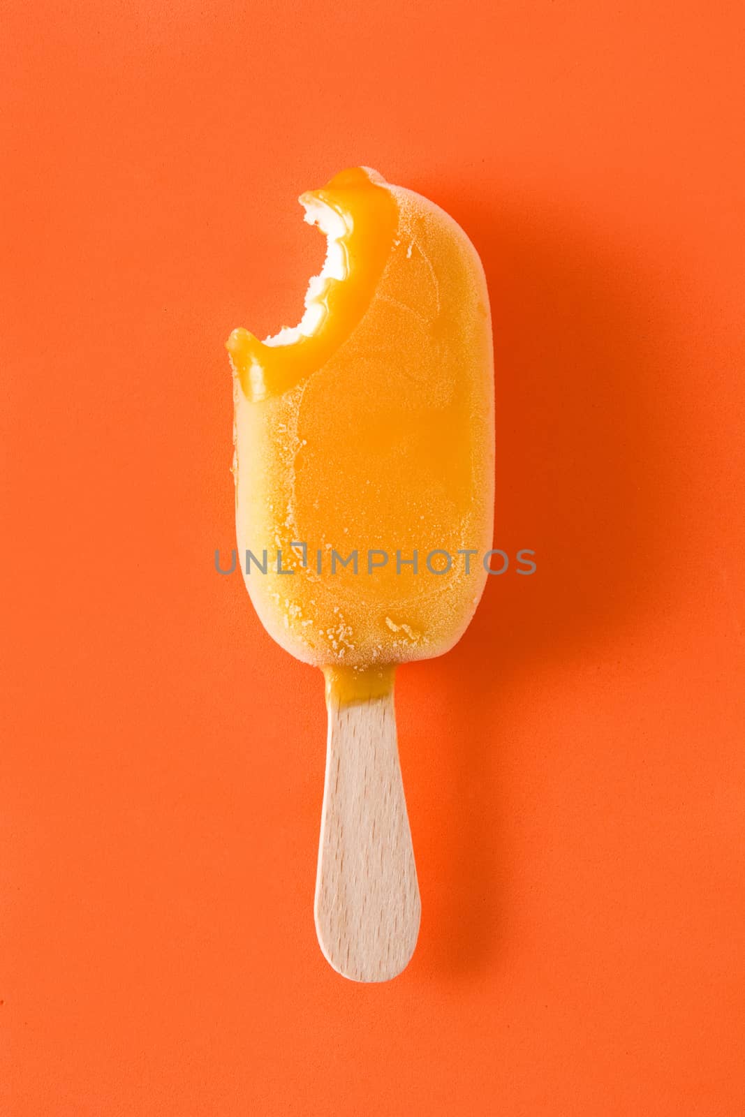 Orange popsicles on orange background by chandlervid85