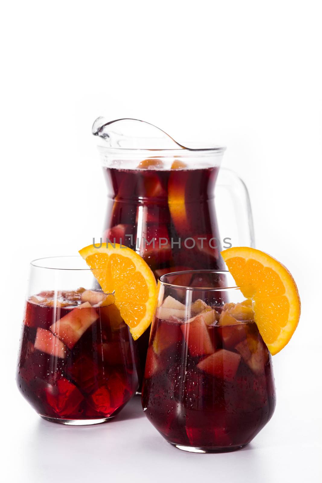 Red wine sangria in glass isolated on white background